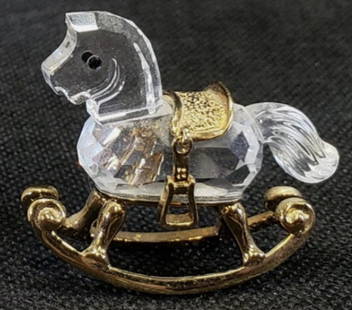 Swarovski Signed Crystal and gold Rocking horse with orig box: Swarovski Signed Crystal and gold Rocking horse with orig box. Measures approx 1.75 inches. No Chips or cracks