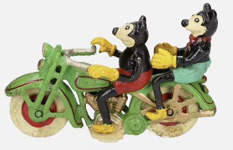 Disney Cast Iron Mickey Mickey Mouse On Motorcycle: Disney Cast Iron Mickey Mickey Mouse On MotorcycleCast iron.Bike painted Red / Green with White wheels.The bike wheels turn.Measures approx. 10cm tall, 7cm wide, by 16cm deep.