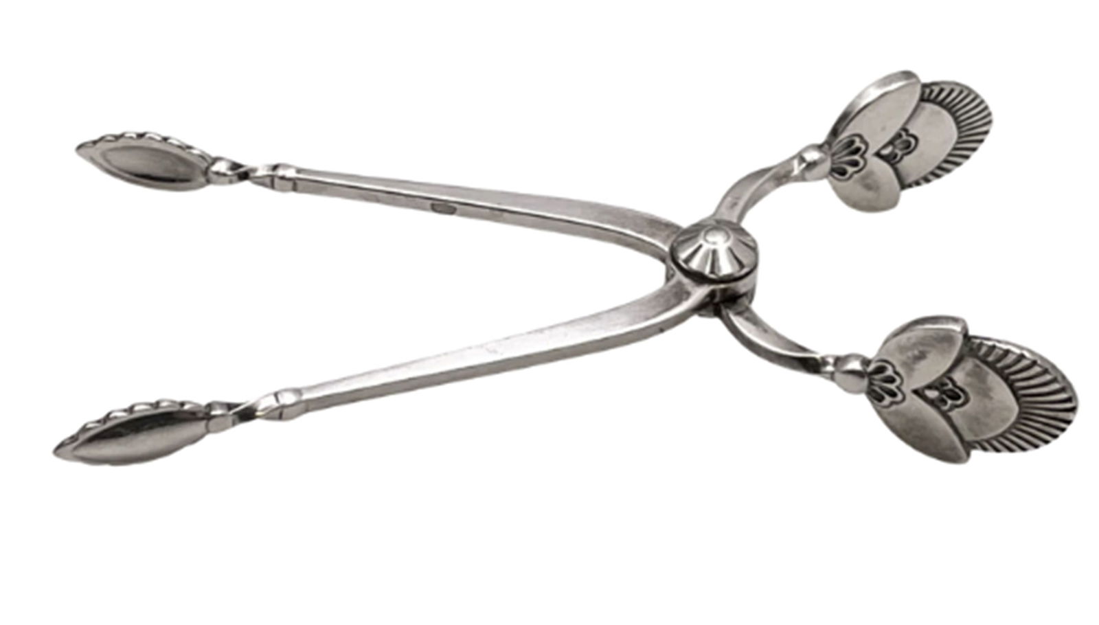 Georg Jensen Sterling Silver Sugar Tongs in Cactus Pattern: Georg Jensen Sterling Silver Sugar Tongs in Cactus Pattern. measuring 3 3/4'' in length by 1 7/8'' in depth, and bearing hallmarks as shown. Designed in 1930 by Gundorph Albertus, the Cactus pattern d