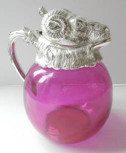 Victorian style French Ram Head Cranberry pink Decanter.: Victorian style French Ram Head Cranberry pink Decanter. The glass body of the Bulldog is a stunning cranberry/pink color. The Ram has a silverplated head with glass eyes. The silverplate is stamped o