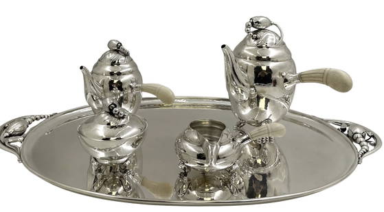 Georg Jensen Sterling Silver Hammered 5-Piece Tea & Coffee Set on Tray in Blossom Pattern Made in: Georg Jensen Sterling Silver Hammered 5-Piece Tea & Coffee Set on Tray in Blossom Pattern Made in Denmark. Georg Jensen sterling silver hand-hammered 5-piece tea and coffee set in the celebrated Bloss