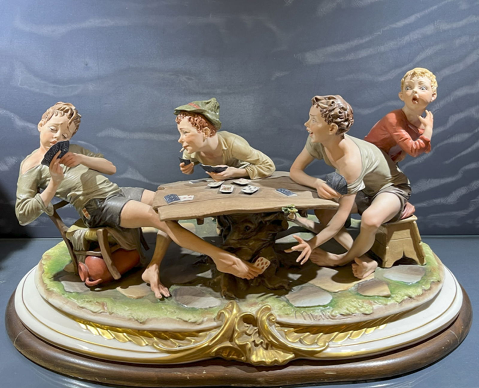 CAPODIMONTE Ceramic Sculpture The players of cards 1950: CAPODIMONTE Ceramic Sculpture The players of cards. Measures approx High 30 cm – wide 30 cm – long 30 cm. Please note: shipping will require international shipping fee with US customs clearance if