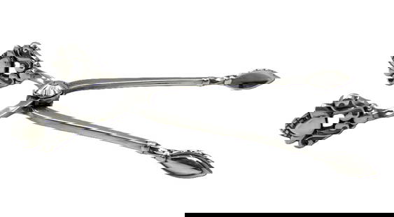 Georg Jensen Sterling Silver Sugar Tongs in Acorn Pattern: Georg Jensen Sterling Silver Sugar Tongs in Acorn Pattern. measuring 3 3/4'' in length by 1 2/3'' in depth, and bearing hallmarks as shown. Danish silversmith Georg Jensen (1866-1935) set up his own s