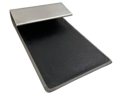 Tiffany & Co. sterling silver notepad holder, with leather back. It measures 5 3/4'' in length by 3: Tiffany & Co. sterling silver notepad holder, with leather back. It measures 5 3/4'' in length by 3 1/2'' in width by 1 1/8'' in height, and bears hallmarks as shown.