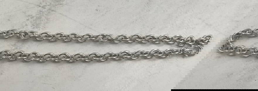 Judith Ripka Sterling Silver Choker Necklace: Judith Ripka sterling silver choker necklace with an elegant design. It measures 18'' in length, weighs 1.7 troy ounces, and bears hallmarks as shown.