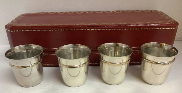 Cartier Sterling Silver Trinity Cup Set of 4 with Original Box: Cartier Sterling Silver Trinity Cup Set of 4 with Original Box Designed by Louis Cartier with the development of the Trinity Ring in 1924. Made of .925 sterling silver, it has 3 entwined rings in of w