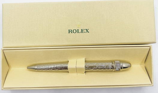 Rolex Ballpoint Pen diamond Pattern Gift Set With Box: Rolex Ballpoint Pen diamond Pattern Gift Set With Box. This exquisite ballpoint pen is a must-have for any collector of fine writing instruments. The pen features a stunning diamond pattern and sleek