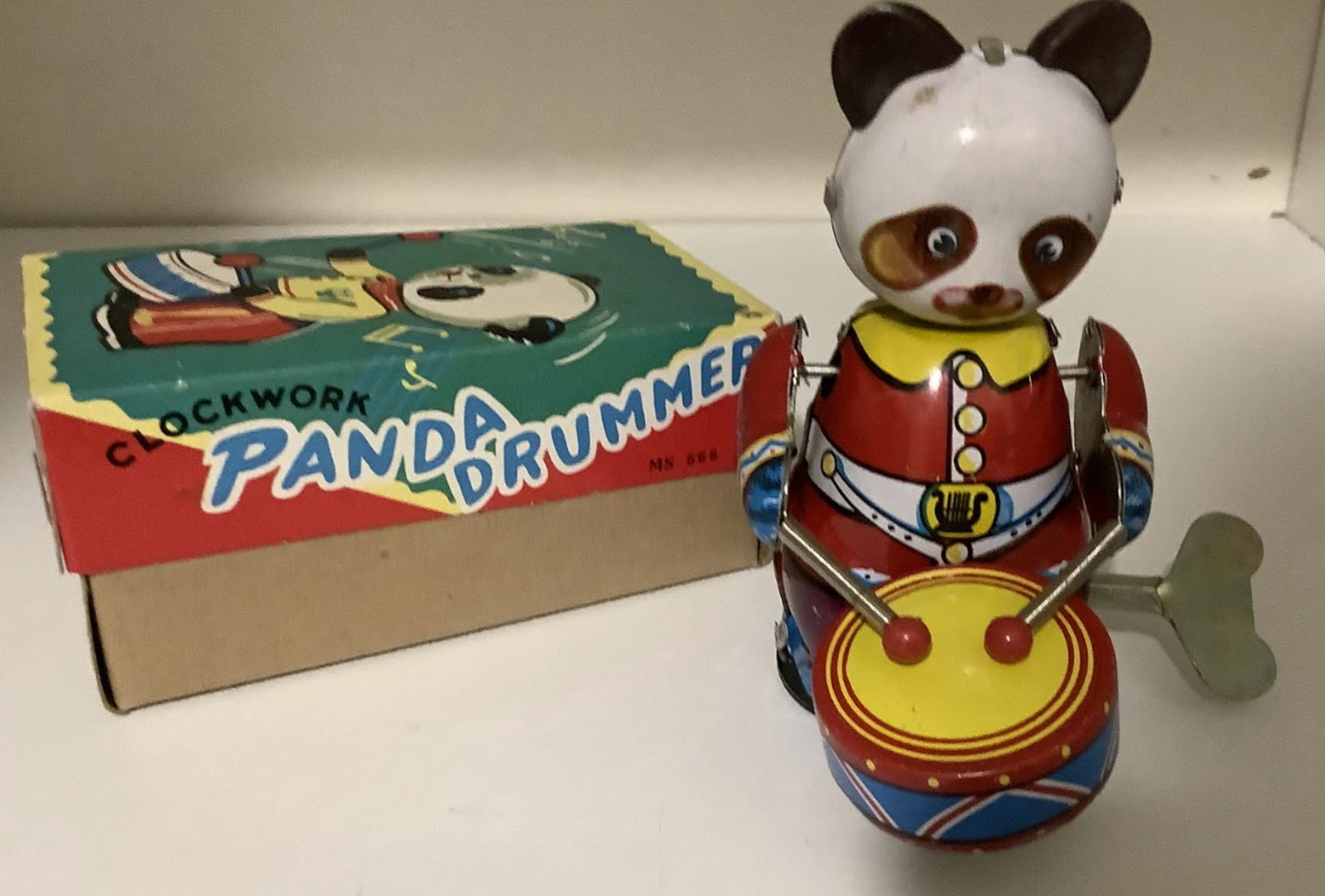 Tin Litho Wind Up Panda Drummer With Original Box & Key: Tin Litho Wind Up Panda Drummer With Original Box & Key Measures approx 4.25 inches tall