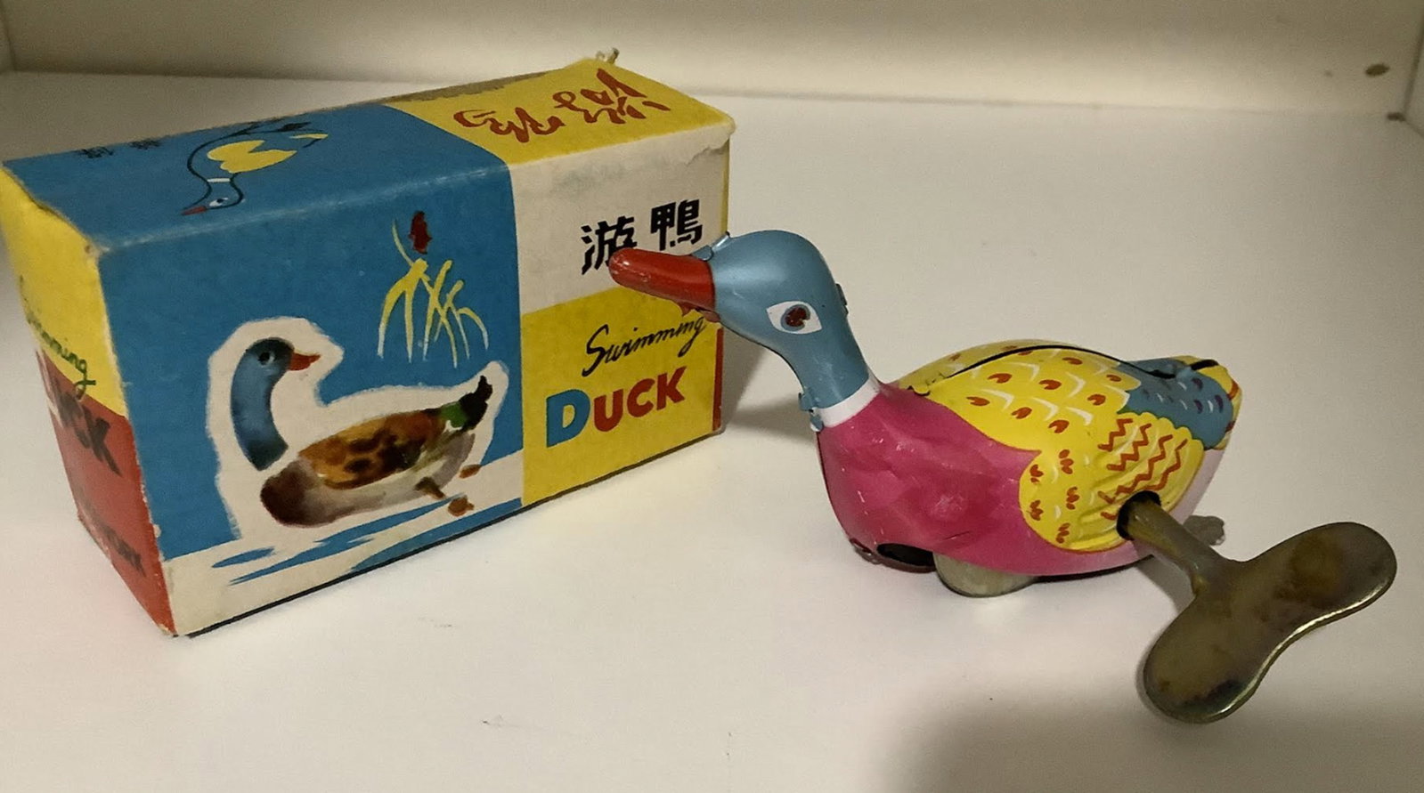 Tin Litho Wind Up Swimming Duck With key and box: Tin Litho Wind Up Swimming Duck With key and box Measures approx 4 inches long