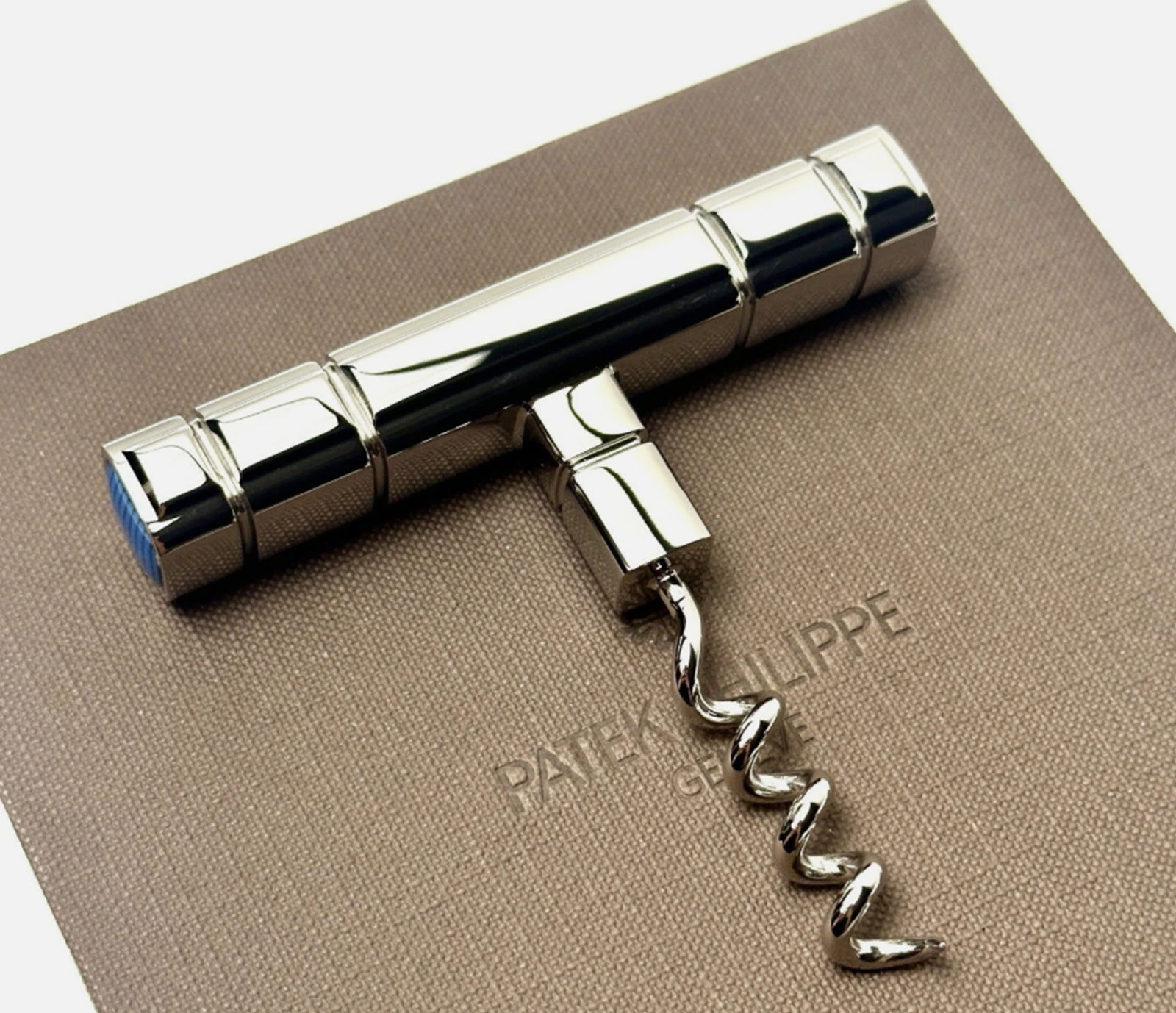 Patek Philippe Wine Corkscrew Bottel Opener With Box: Patek Philippe Wine Corkscrew Bottel Opener With Box Measures approx 3.5 inches wide come with box