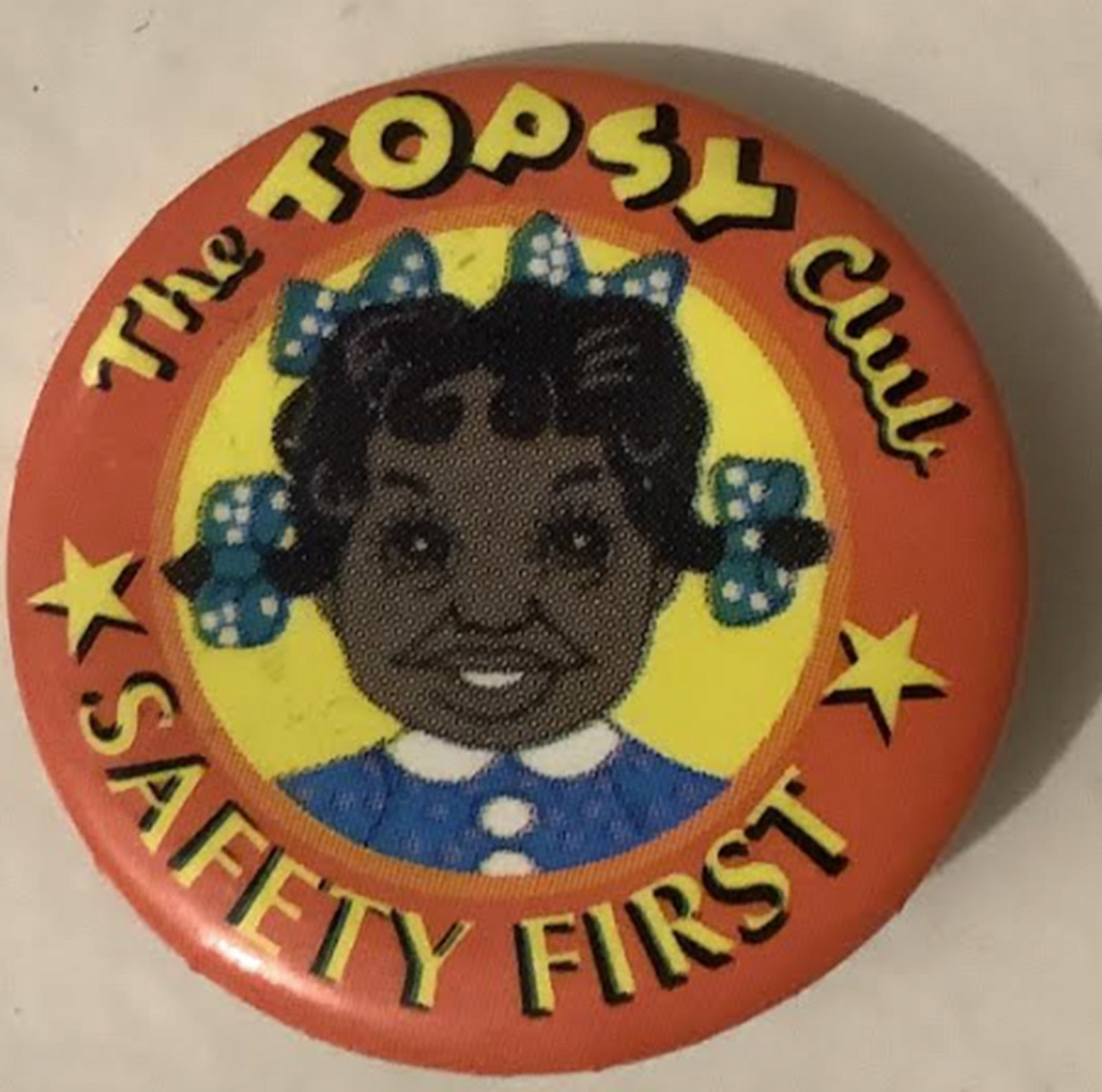 Black Americana Tin The Topsy Club Button Pin: Black Americana Tin The Topsy Club Button Pin Measures approx 1.25 inches accross