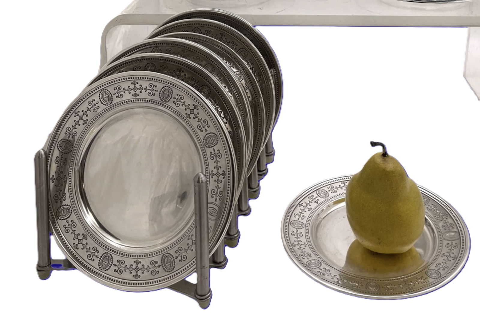 Tiffany & Co. Set of 14 Sterling Silver Bread/Dessert Plates / Coasters, Made in USA: Tiffany & Co. Set of 14 Sterling Silver Bread/Dessert Plates / Coasters, Made in USA. Art Deco style. pattern number 20198B from 1923, the rims beautifully adorned with engraved geometric and urn-like