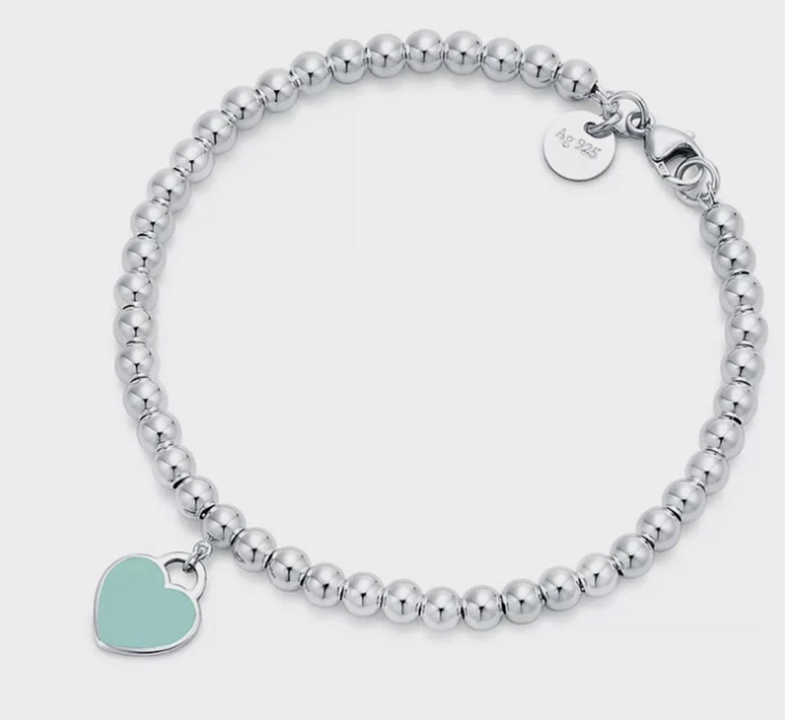 Tiffany & Co. Sterling Silver Blue Enamel Heart Bracelet And Pouch (1 of 5)