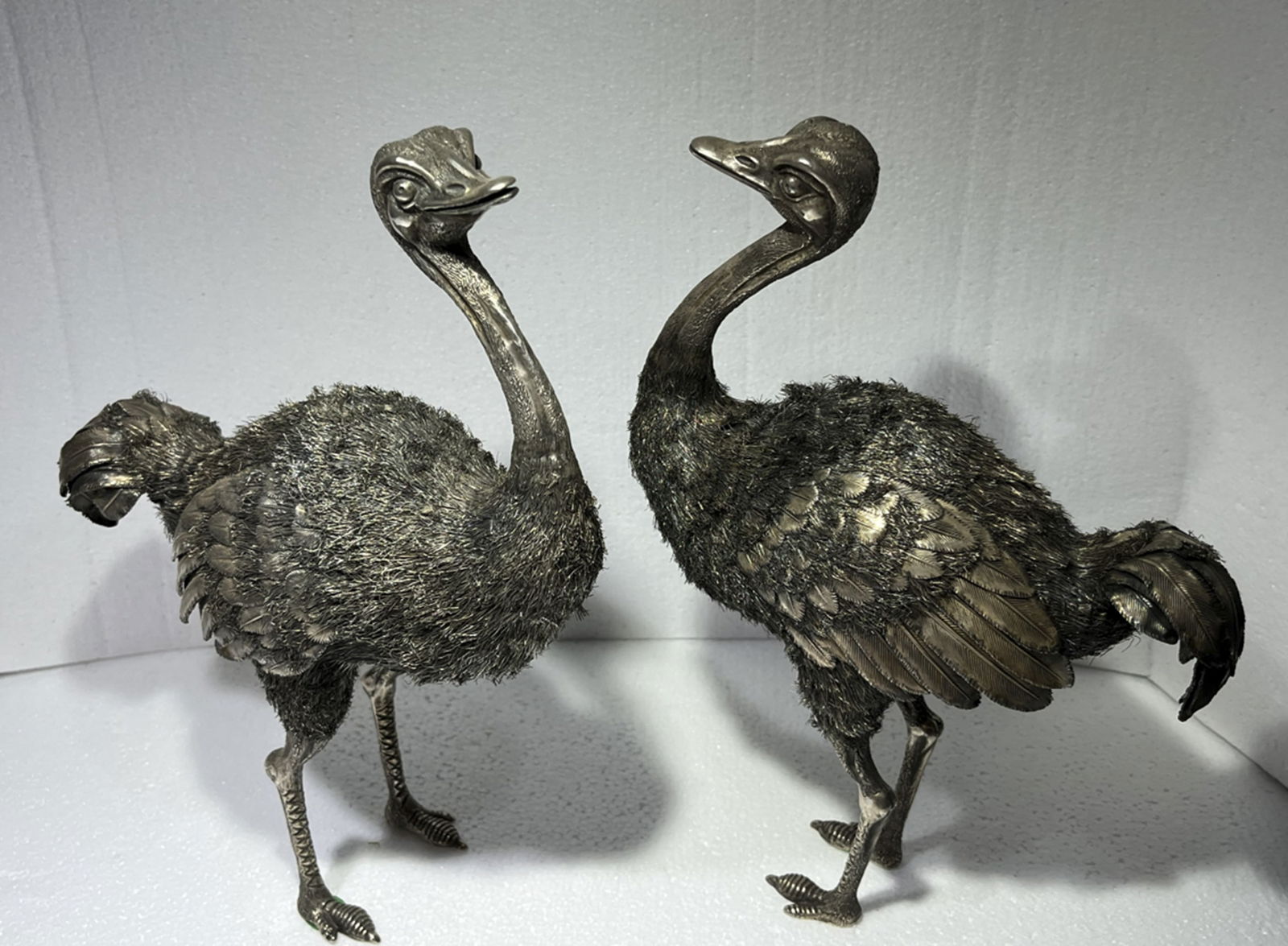 BUCCELLATI STERLING SILVER PAIR OF OSTRICH FIGURINE MADE IN ITALY: BUCCELLATI STERLING SILVER PAIR OF OSTRICH FIGURINE MADE IN ITALY - vintage animals made by mario buccellati performing his famous furry technique Measures approx High: 24 cm, Wide: 8 cm, Long: 19 cm