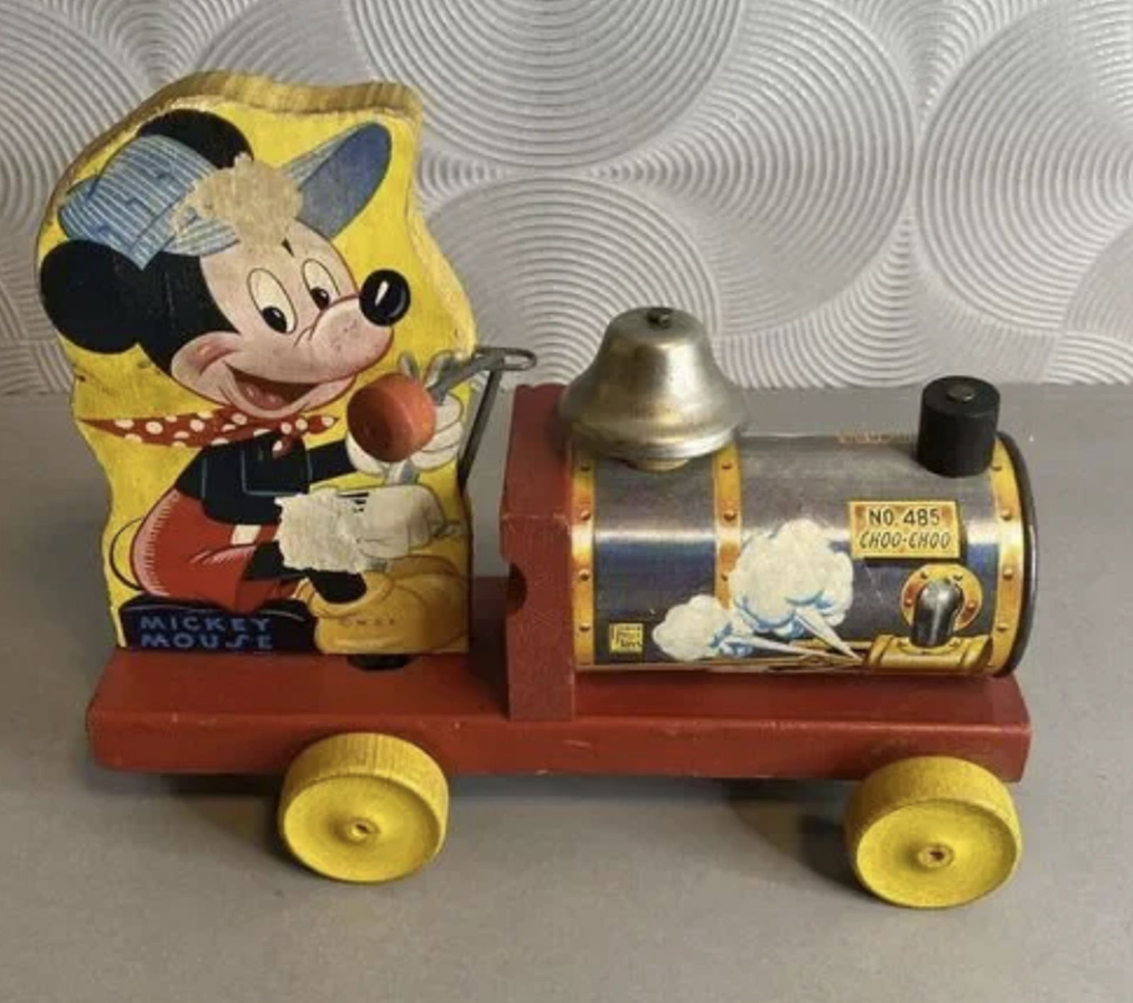 Fisher Price Wood Pull Toy? Disney Mickey Mouse Choo-Choo Engine #485: Fisher Price Wood Pull Toy? Disney Mickey Mouse Choo-Choo Engine #485. no string Bell sounds as expected when the wheels are rolled.
