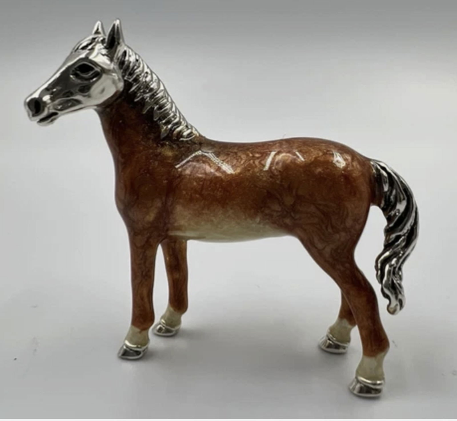Saturno Sterling Silver With Enamel Horse Figurine Made in Italy: Saturno Sterling Silver With Enamel Horse Figurine Made in ItalyEnamel over Sterling Silver 925Hand Made enamel makes each piece uniqueGlossy Colorful Copper Chestnut with Cream Underbelly and 4 Socks