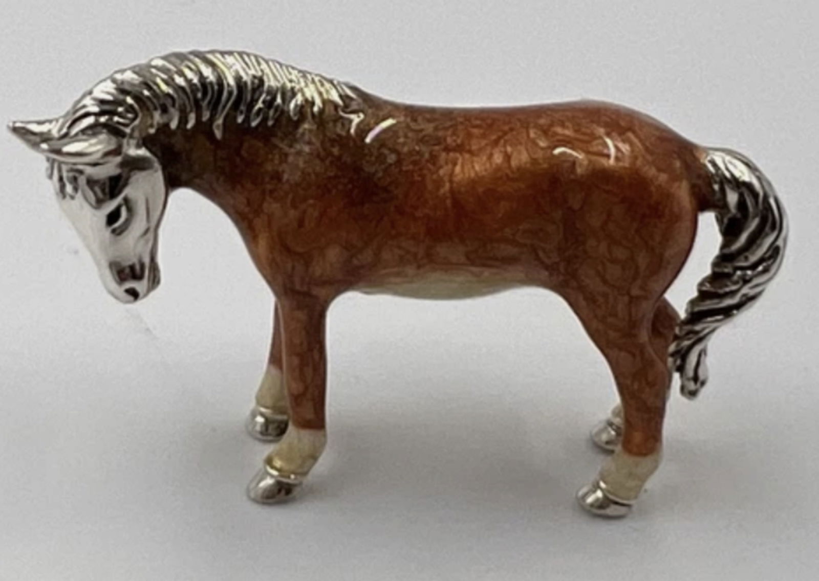 Saturno Sterling Silver With Enamel Horse Figurine Made in Italy: Saturno Sterling Silver With Enamel Horse Figurine Made in ItalyEnamel over Sterling Silver 925Hand Made enamel makes each piece uniqueGlossy Colorful Copper Chestnut with Cream Underbelly and 4 Socks