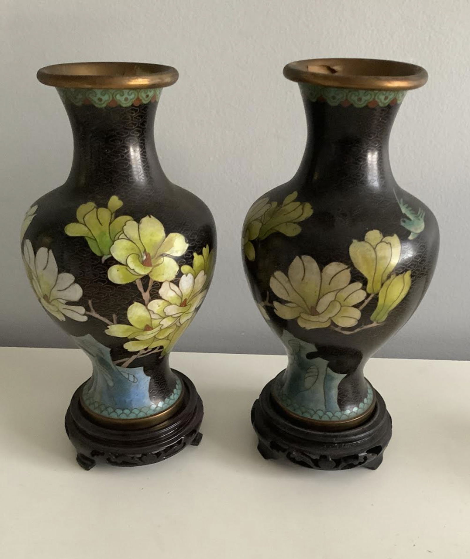 Pair Of Chinese Cloisonne Tall Vase With Wooden Stands: Pair Of Chinese Cloisonne Tall Vase With Wooden Stands. Measures approx 9.5 inches in heightStand measure approx 4.25 inches wide