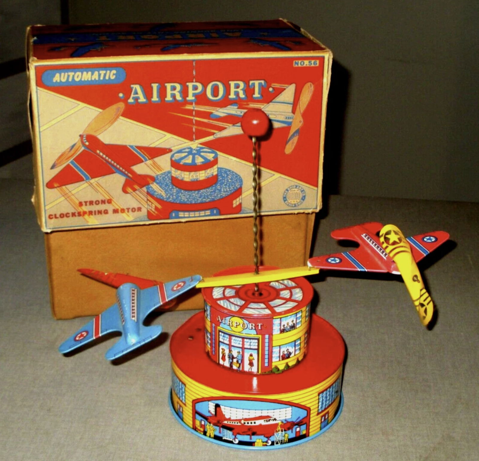 OHIO ART TIN Litho AIRPORT TOWER WIND-UP WITH ORIG BOX: OHIO ART TIN Litho AIRPORT TOWER WIND-UP WITH ORIG BOX. Measures approx 9.5 inches tall and works