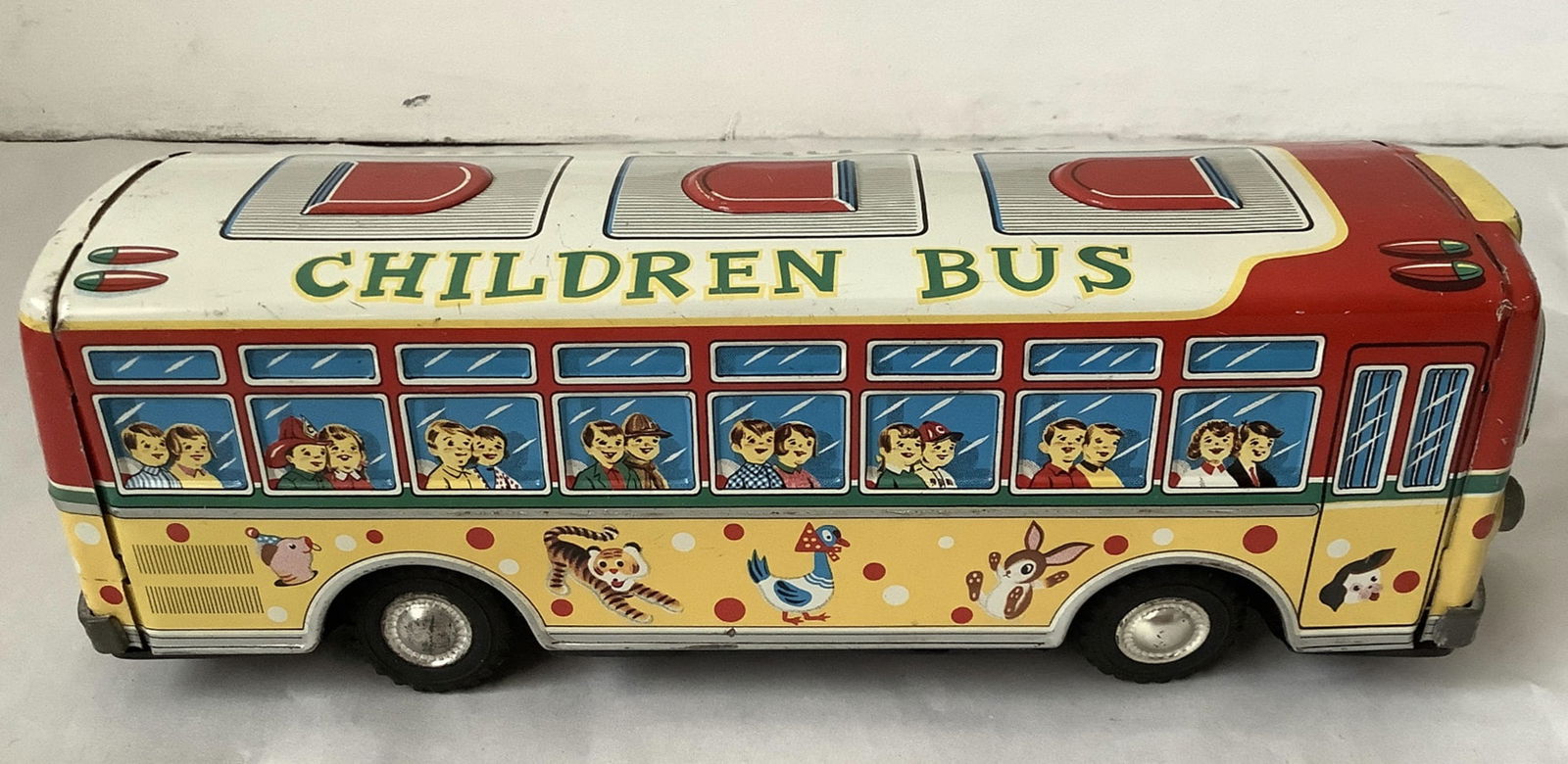 Japanese Tin Litho Childrens Bus: Japanese Tin Litho Chidrens Bus Measures approx 9.5 inches longx 3.25 inches tall