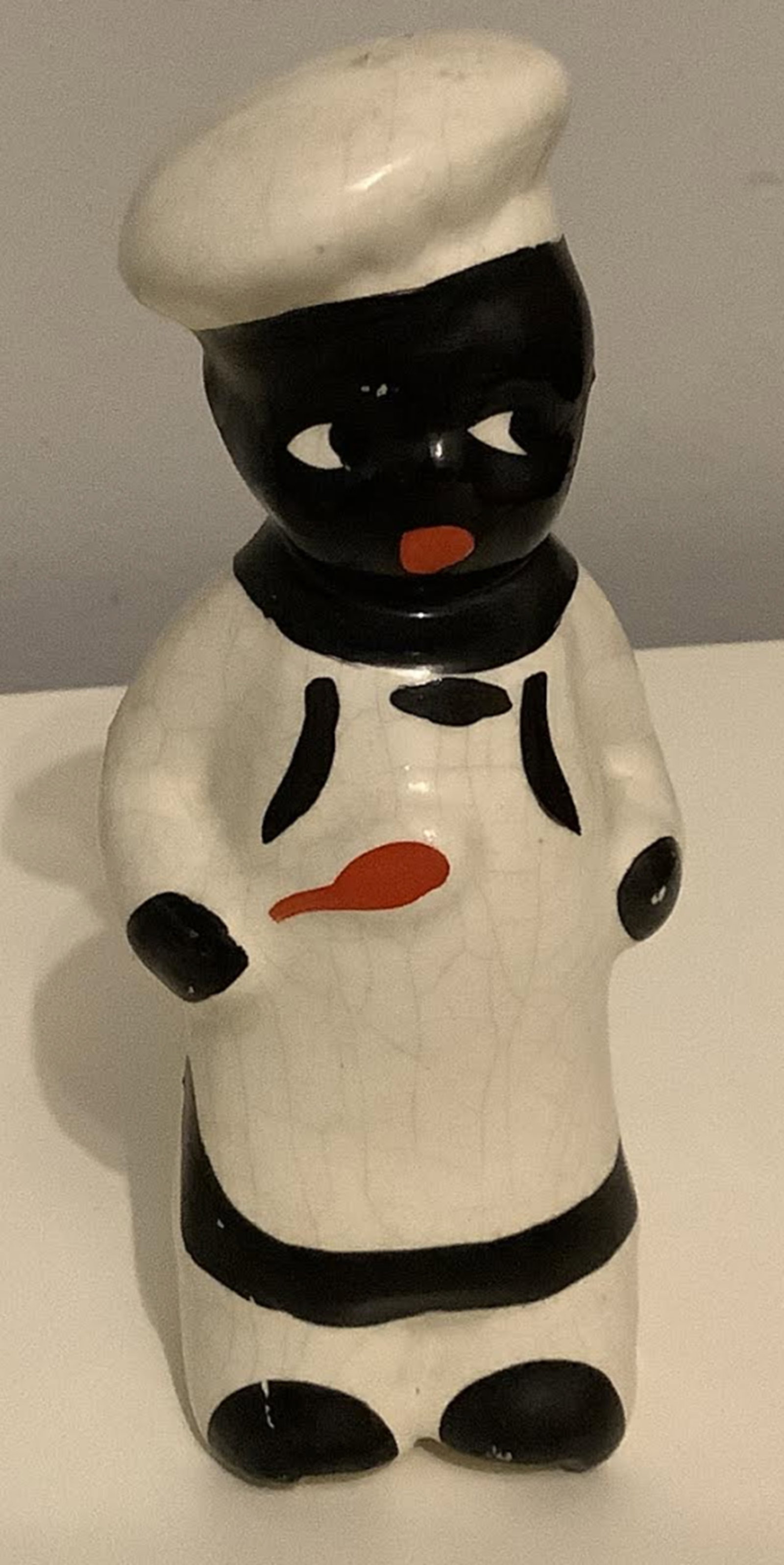 Black Americana Era Salt or Pepper Shaker: Black Americana Era Salt or Pepper Shaker Measures approx 5.25 inches tall no chips or cracks present