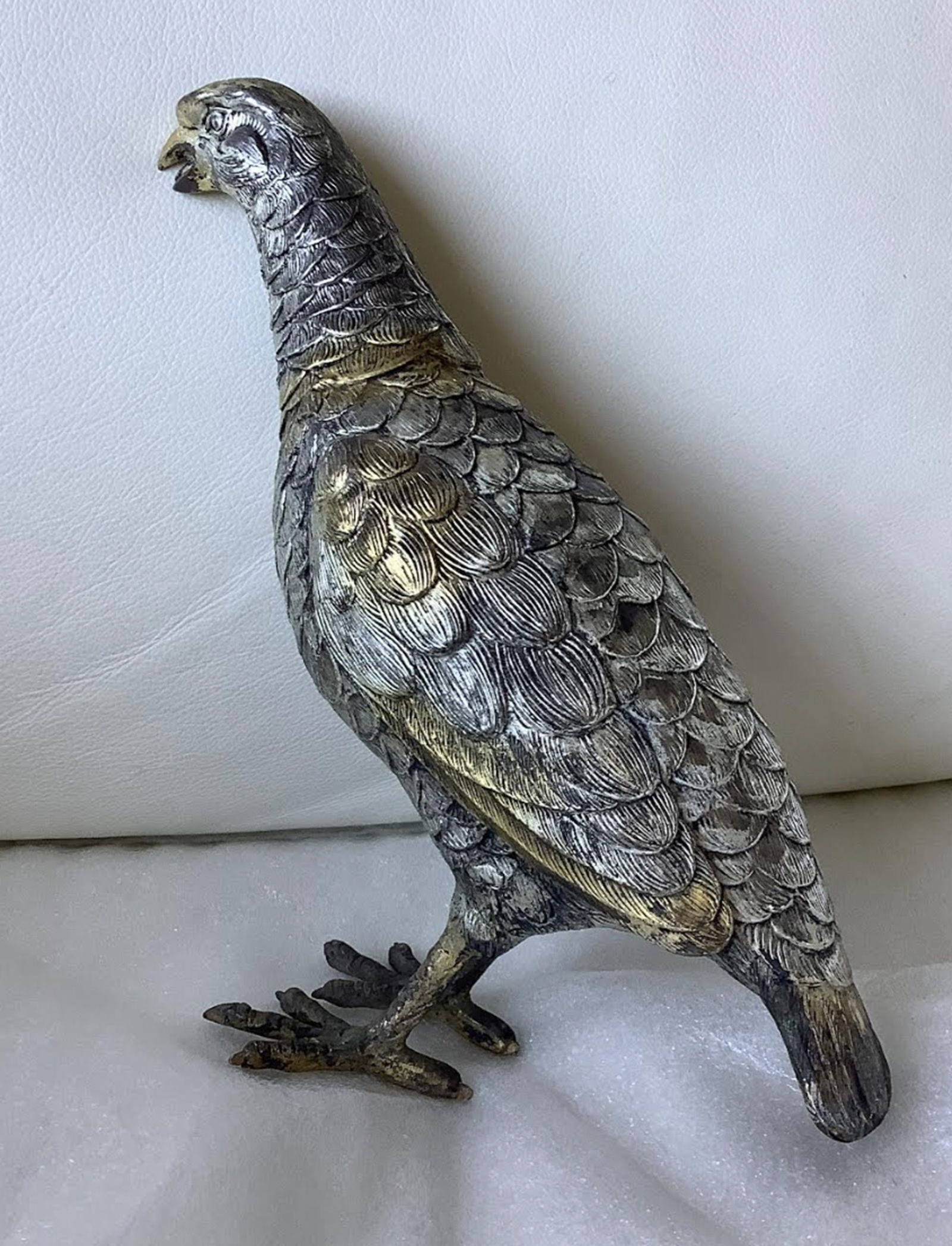 Sterling Silver With Gilted Design Pheasant Bird Figurine Made in Spain: Sterling Silver With Gilted Design Pheasant Brid Figurine Marked Sterling measuress aprrox 6.5 inches tallest point. Marked Sterling and Spain on its bottom7.5 inches at its wides point