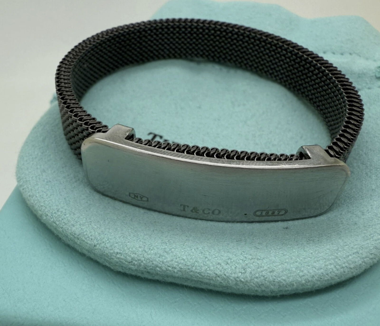 Tiffany Co Stainless Steel Mesh Bracelet With Box: Tiffany Co Stainless Steel Mesh Bracelet With Box. Measures approx 6.25 inches great condtion