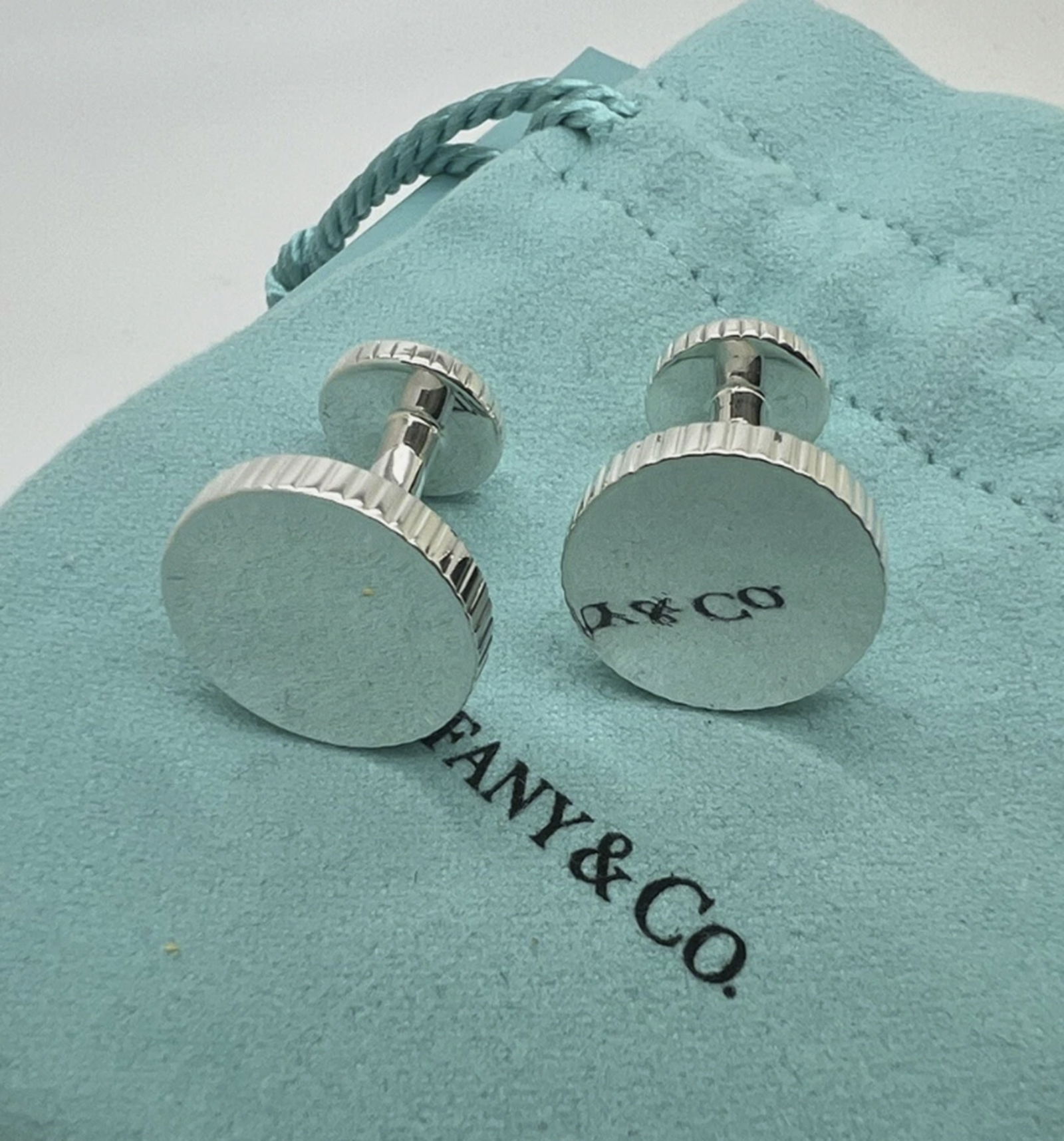Tiffany Co Sterling Silver Coin Edge Circle Cuff Link Cufflinks With Pouch and Box: Tiffany Co Sterling Silver Coin Edge Circle Cuff Link Cufflinks With Pouch and Box The large end measures 17mm in diameter and the smaller end is 11mm