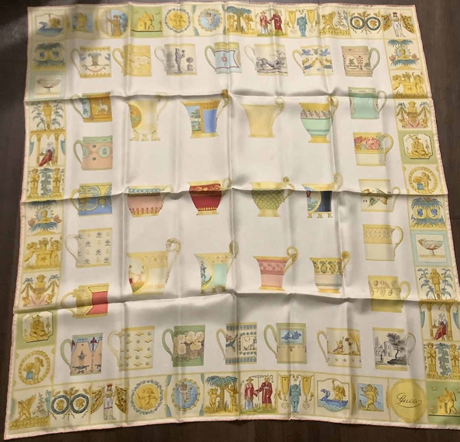 Gucci Silk Scarf Made in Italy: Gucci Silk Scarf Made in Italy. Measures approx 34 x 34.5 Never Worn New Conditon no stains or damage. Scarve is in a packaged clear bag like new condition