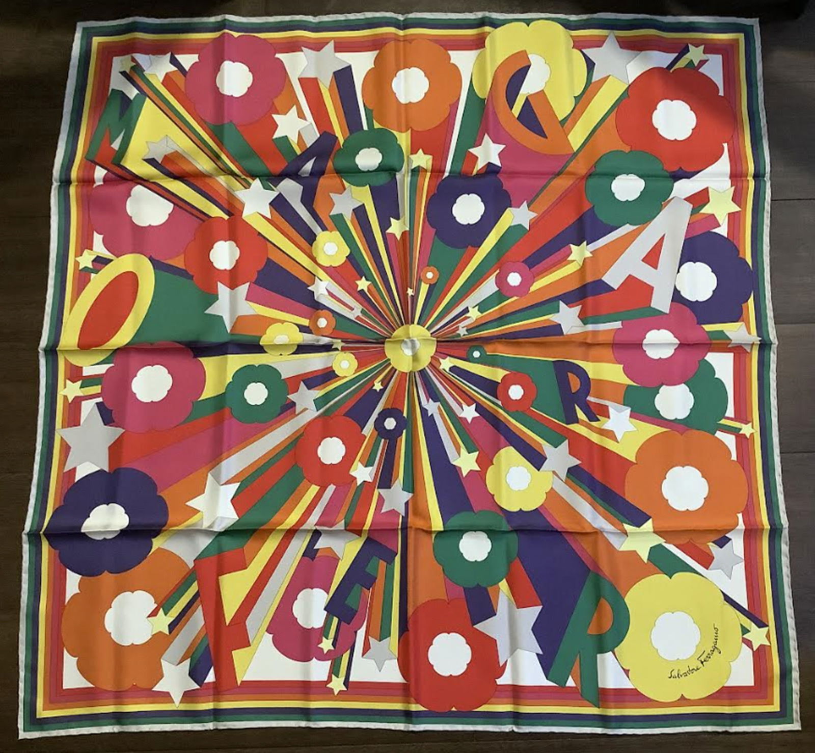 Salvatore Ferragamo Silk Fashion Scarve Made in Italy.: Salvatore Ferragamo Silk Fashion Scarve Made in Italy. Measures approx 34 x 34 inches Great New Condtion! Scarve is in a packaged clear bag like new condition