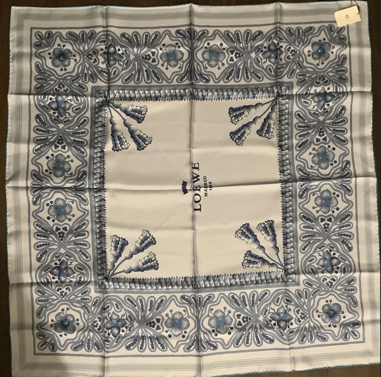 Loewe Silk Scarf Made In Italy With Tag: Loewe Silk Scarf With Tag Made In Italy Measures approx 35.5 inches Never worn No Stains or Damage. Scarve is in a packaged clear bag like new condition