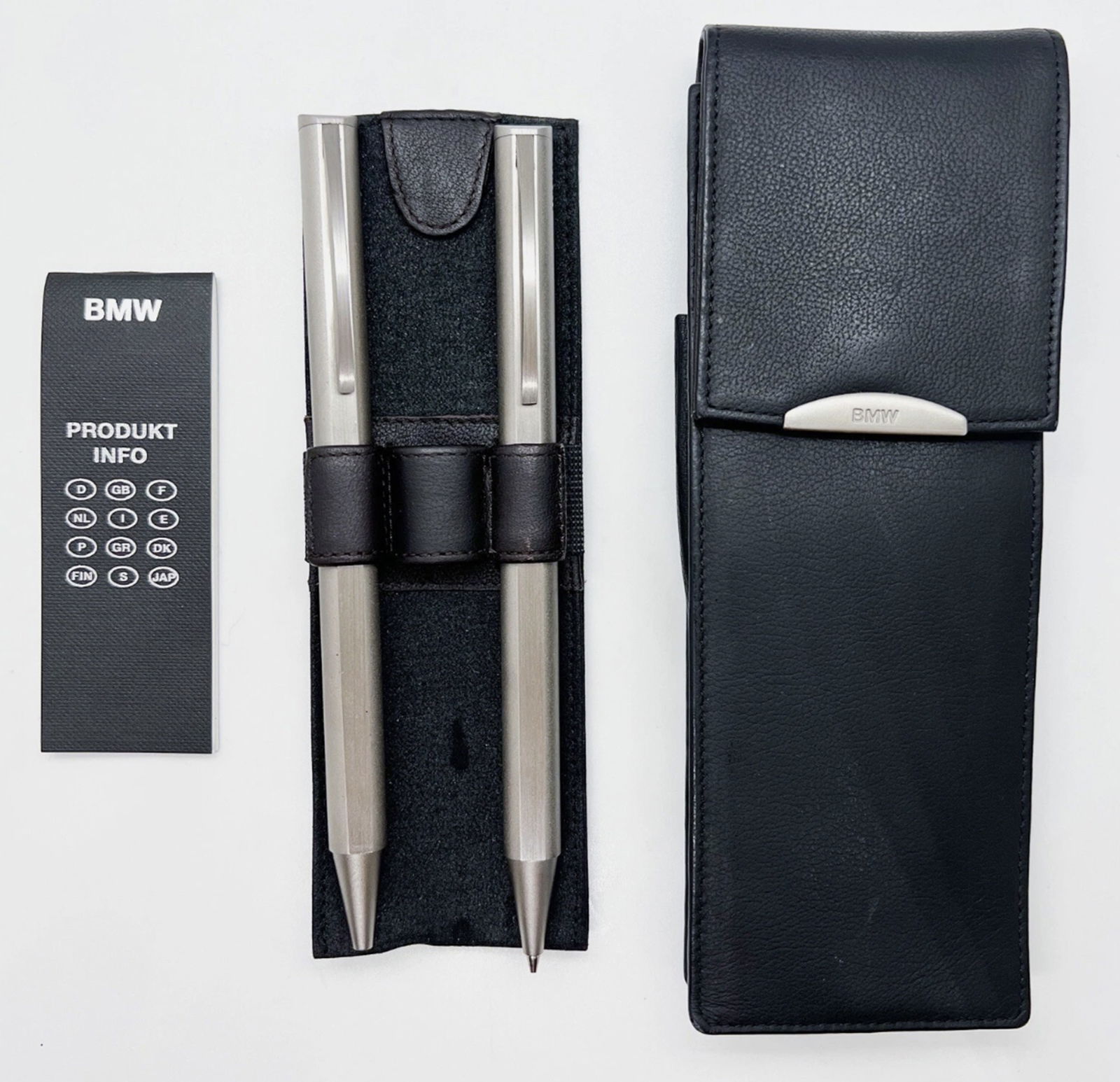 BMW Titanium Ballpoint & Mechanical Pencil Set Diplomat With Leather Case: BMW Titanium Ballpoint & Mechanical Pencil Set Diplomat With Leather Case. BMW titanium version ballpoint pen and mechanical pencil with leather case.Pencil: very good condition with twist functionPen