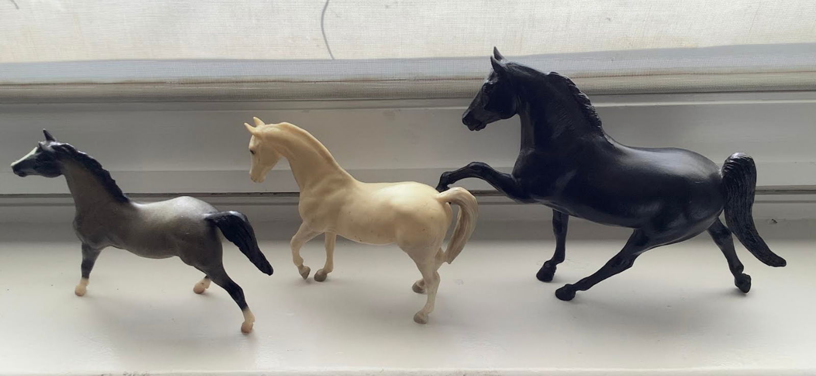 Breyer Galloping Horse Figurines Set of 3: Breyer Galloping Horse Figurines Set of 3. Measures approx Black 11.5 inches wide. 9 inches at its tallest pointWhite horse. 7 3/4 inches wide. 6.5 inches at its tallest pointGrey horse. 8.5 inches wi
