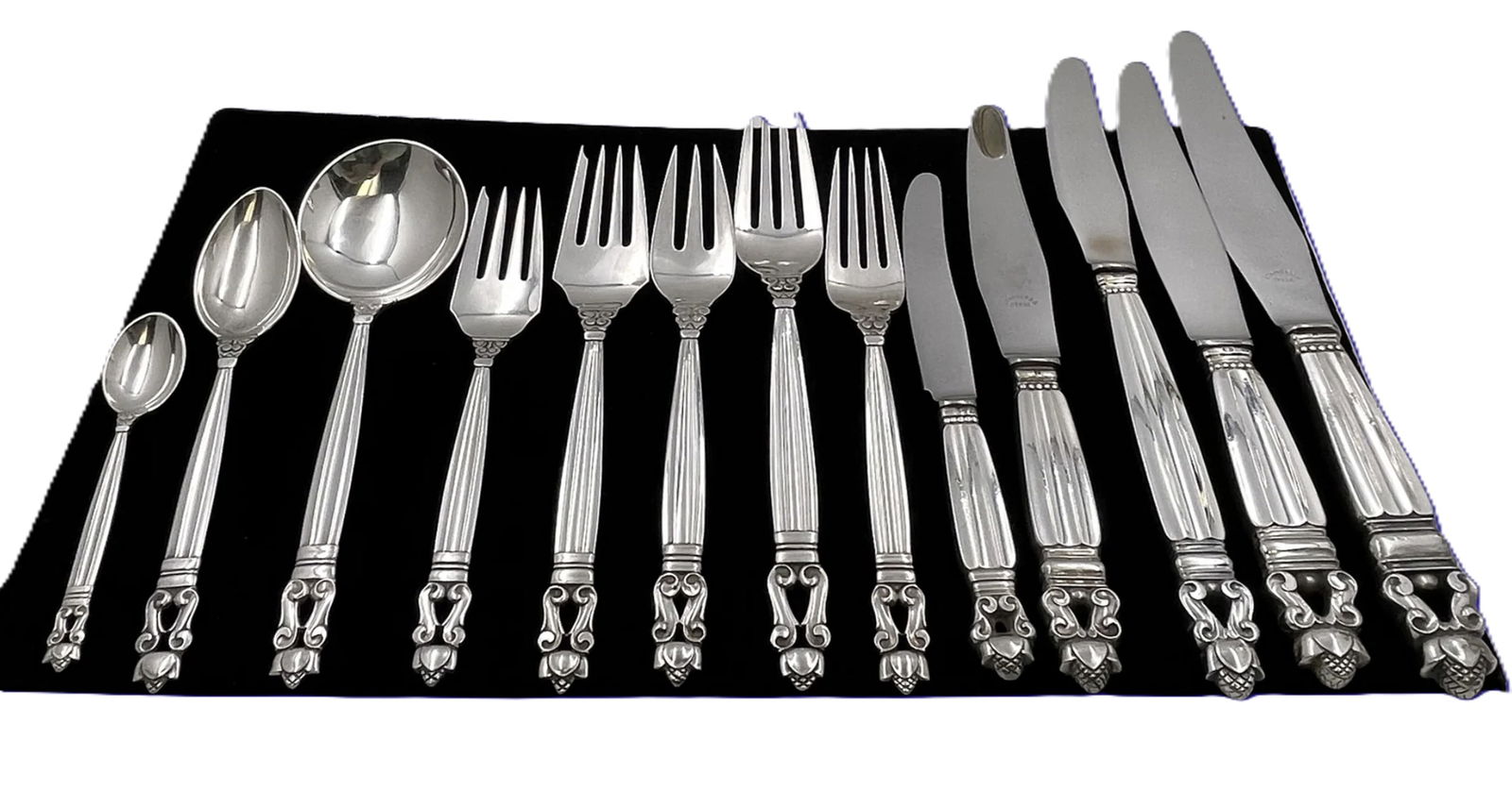 Georg Jensen Sterling Silver Acorn Flatware Service Set a Total of 52-Pieces: Georg Jensen Sterling Silver Acorn Flatware Service Set a Total of 52-Pieces. Georg Jensen sterling silver flatware set, in the celebrated Acorn pattern, with natural motifs and beautifully hand-hamme