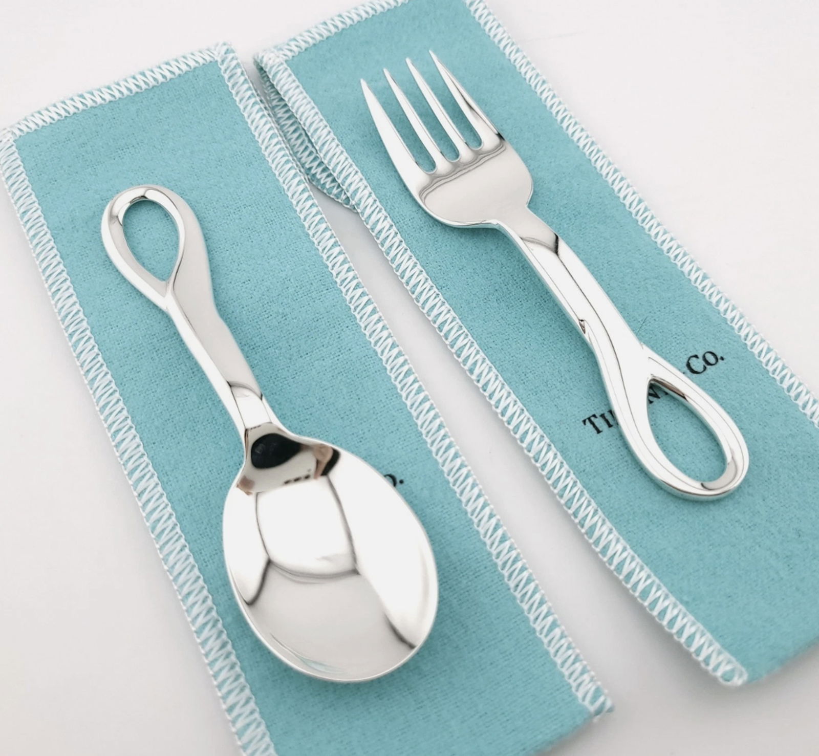 Tiffany & Co. Sterling Silver Elsa Peretti Sppon and Fork Set With Pouch: Tiffany & Co. Sterling Silver Elsa Peretti Padova Baby Feeding Spoon & Fork Set with Pouch. Measures approx Spoon Length: 4' InchFork Length: 4' Inch
