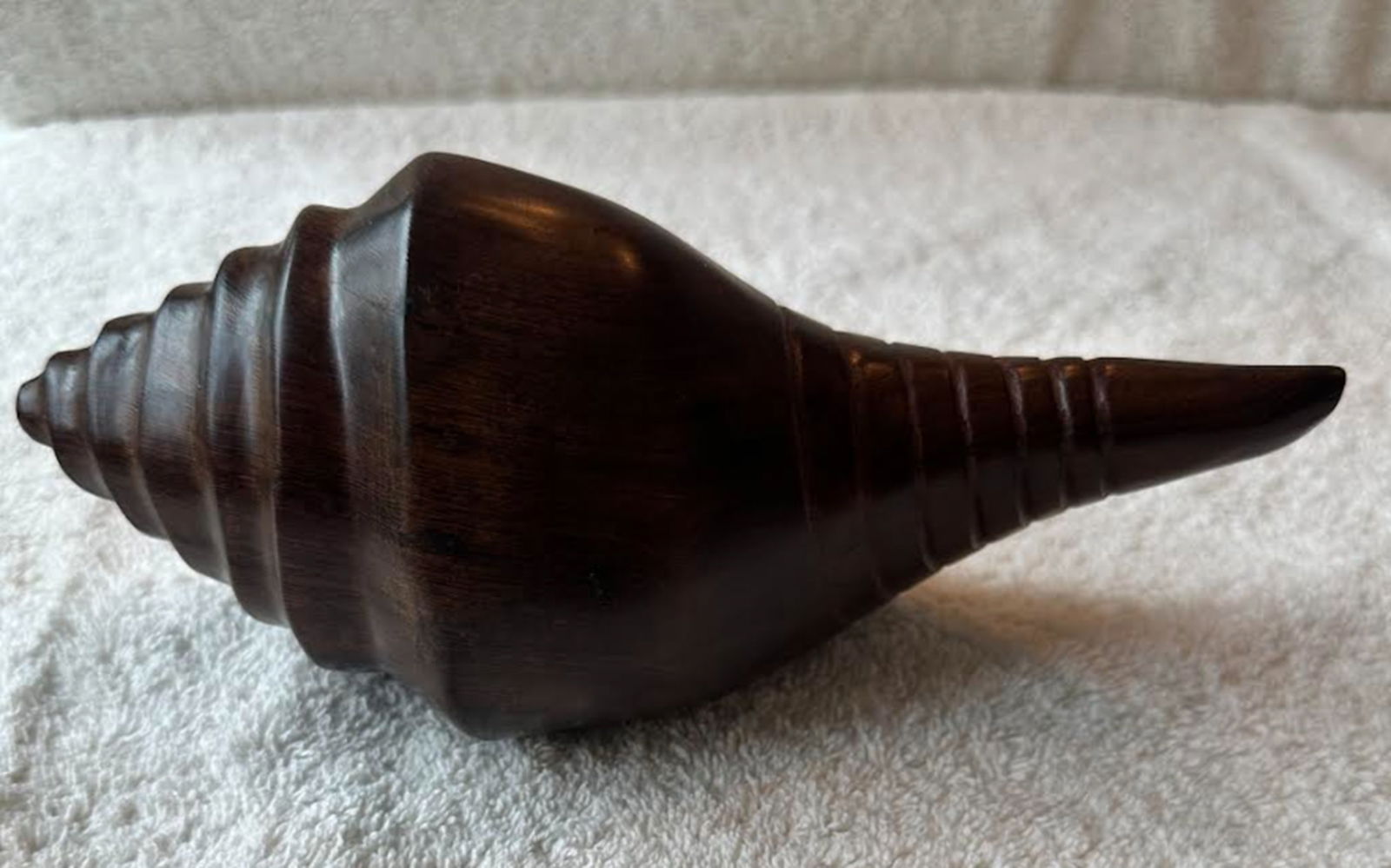 Hand Carved Ironwood Snail Figurine Statuette Circa 1982: Carved in 1982 by Siri Mercedes Diaz, this beautiful snail in solid desert ironwood captures the quiet grace and enduring symbolism with exceptional attention to detail. The smoothly , flowing contour