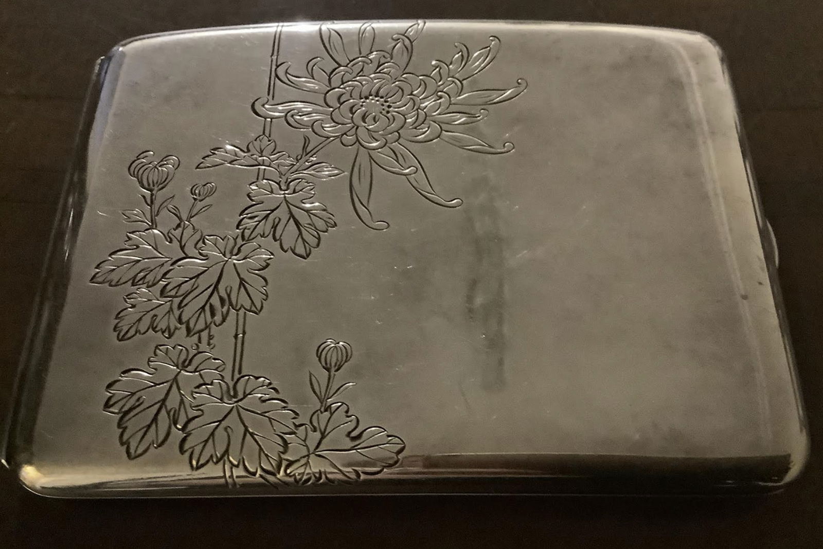 K Uyeda Signed Japanese Sterling Silver Cigarette Case: K Uyeda Signed Japanese Sterling Silver Cigarette Case. measures approximately 4 ½ inches long by 3 ¼ inches tall by 3/8 of an inch wide. Marked “STERLING 950 K UYEDA” on the low