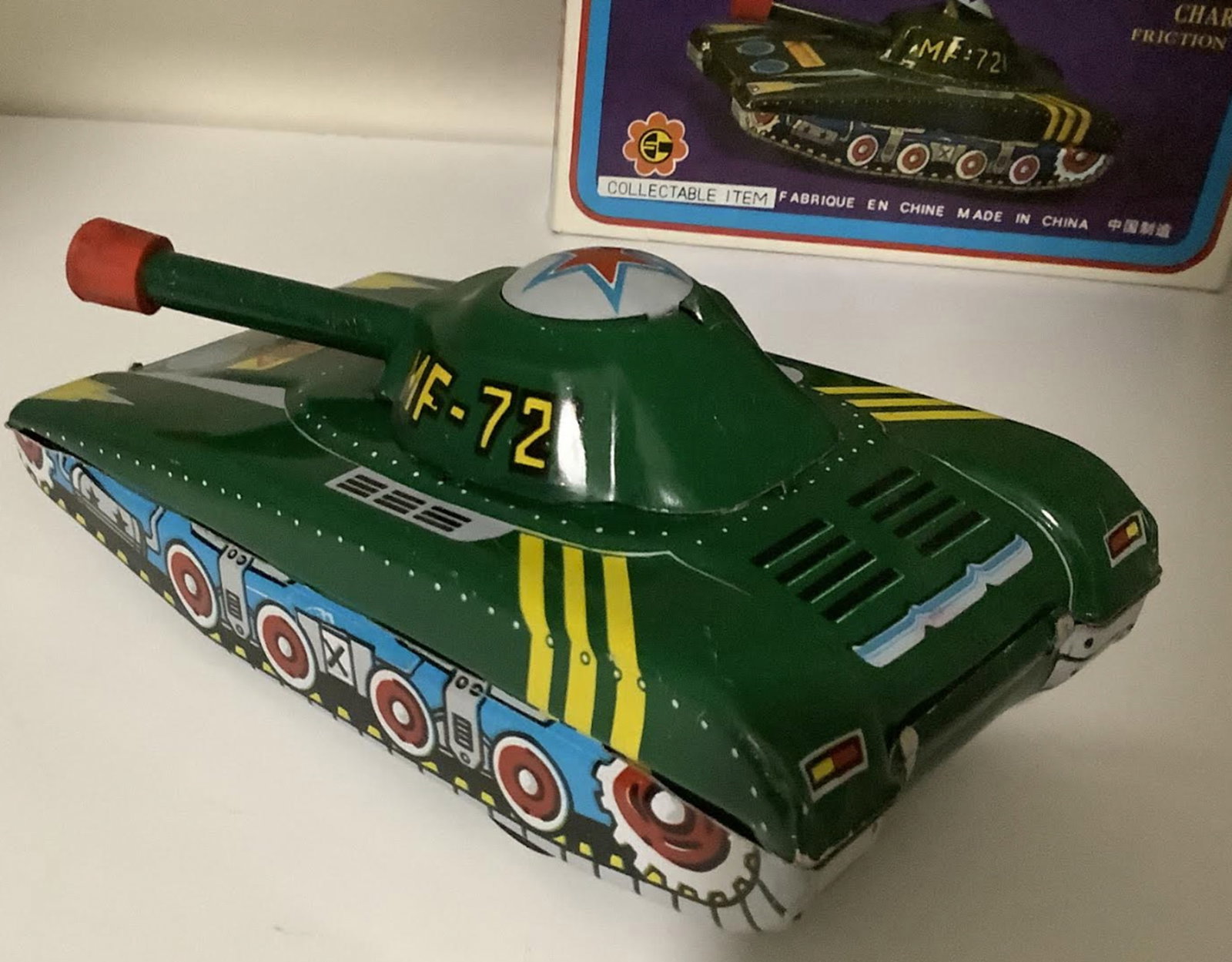 Tin Litho Friction Tin litho Light tank My-721 With Original Box: Tin Litho Friction Tin litho Light tankMy-721 With Original Box Measures approx 6 inches long and 3.25 inches deep