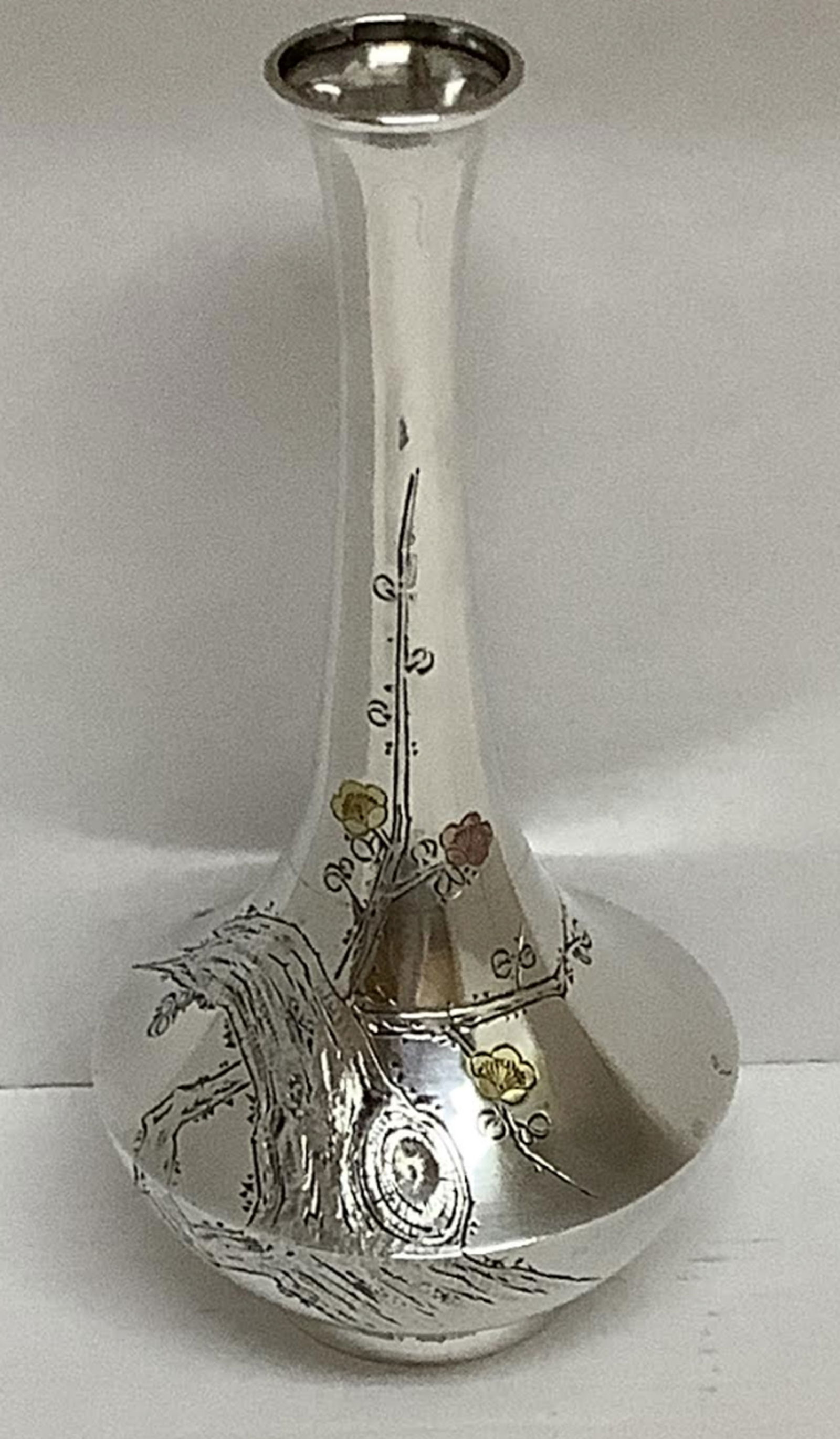 Japanese Meiji Sterling Silver Mixed Metals Vase: Japanese Meiji Sterling Silver Mixed Metals Vase. Japanese Meiji Period (1868-1912) silver .999 vase with beautiful Sakura, floral an other decorative engravings and mix-metal - gold and copper inlays