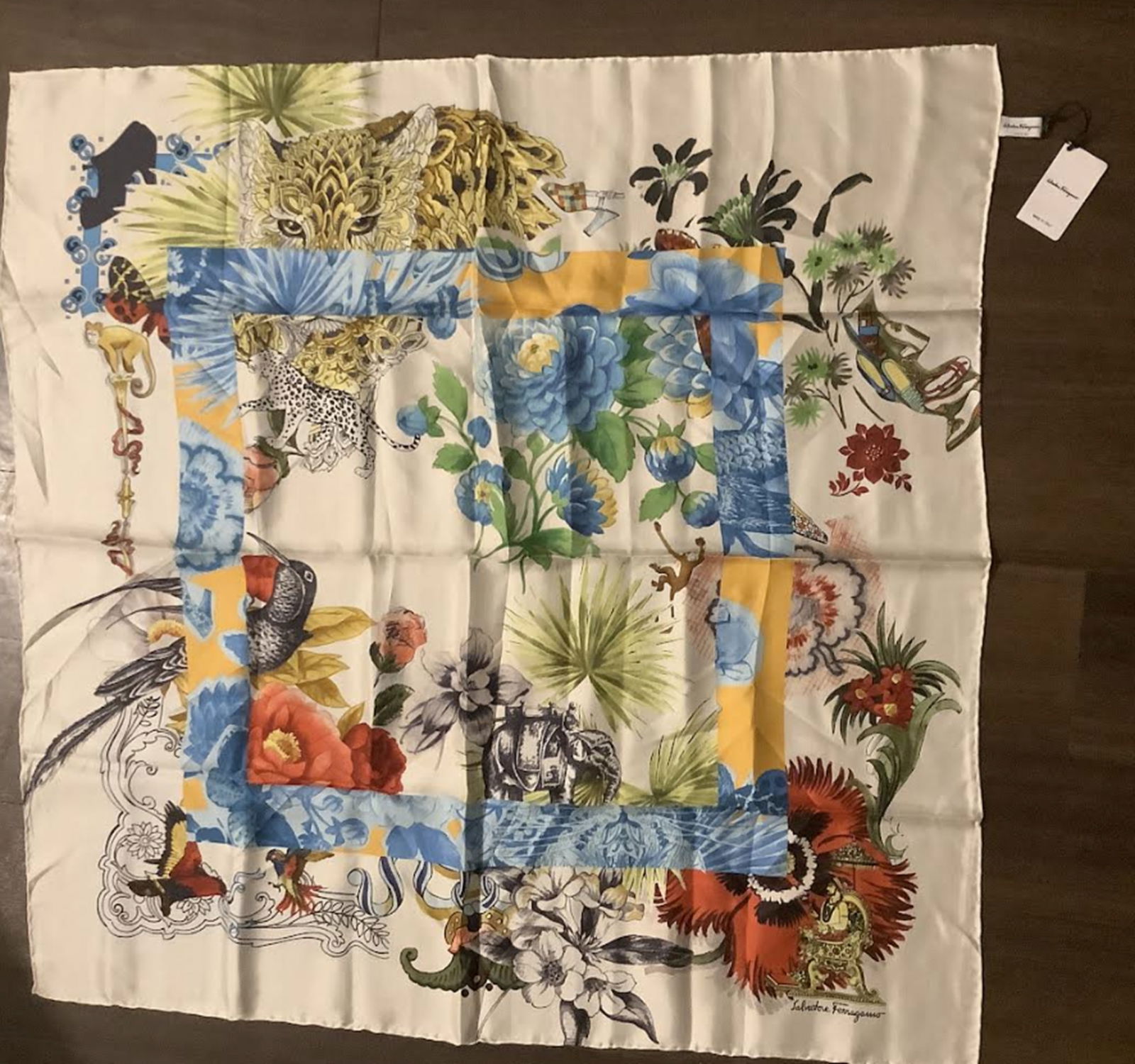 Salvatore Ferragamo Silk Fashion Scarf With Tag Made in Italy.: Salvatore Ferragamo Silk Fashion Scarf With Tag Made in Italy. Measures approx 35" x 34.5" inches Great New Condtion!