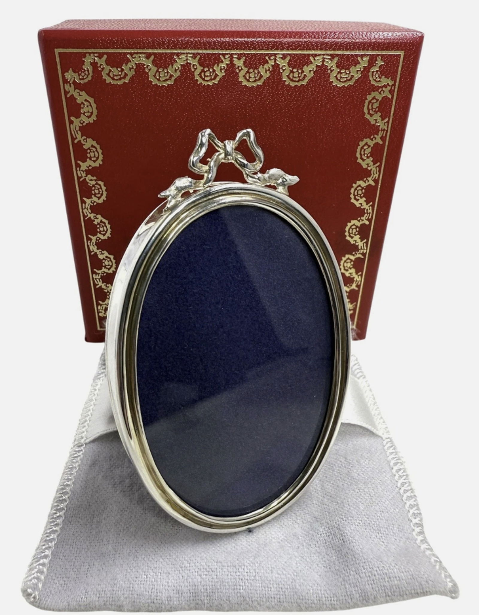 Cartier Sterling Silver Ribbon Small Oval Picture Frame With Box & Pouch: Cartier Sterling Silver Ribbon Small Oval Picture Frame With Box & Pouch Measures approx Measuring 7 cm in height, 5 cm in width, Great condition.