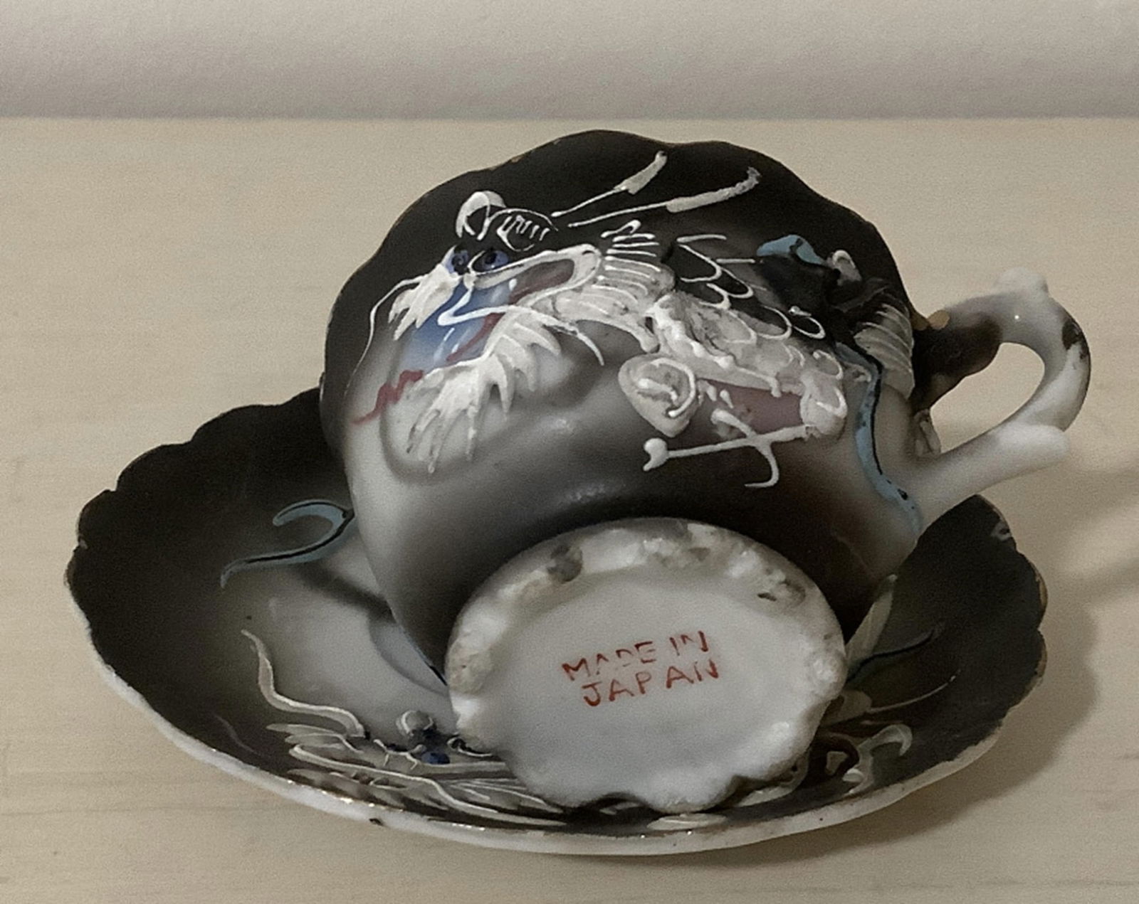 Japanese Ceramic Cup and Saucer: Ceramic Cup and Saucer Made In Japan Measures approx 3.5 plate cup width 2.5 from handle