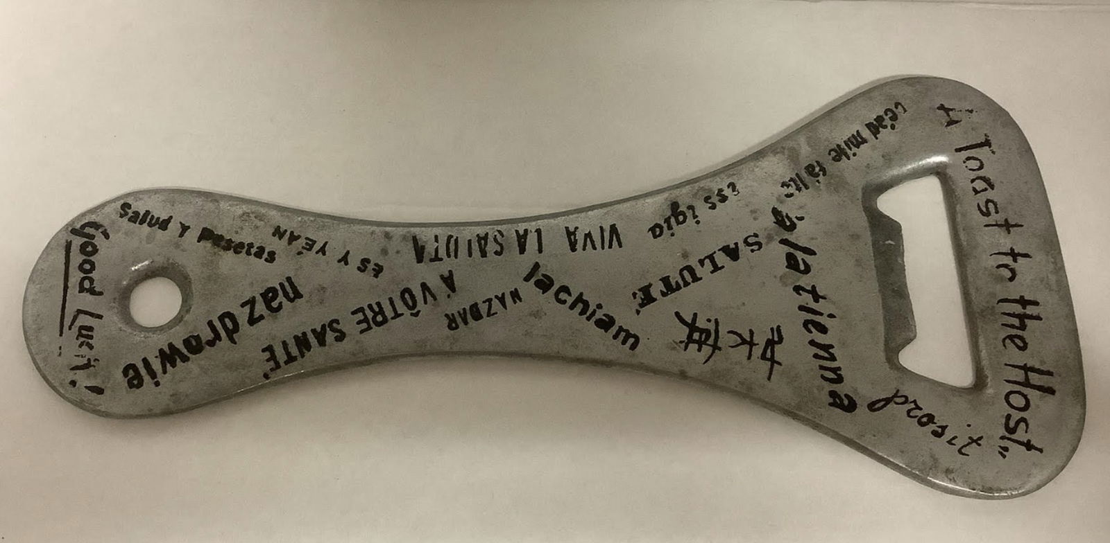 Pressed Steel Bottle Opener Made in Italy pattern 190: Pressed Steel Bottle Opener Made in Italy pattern 191 Measures approx 10 inches long