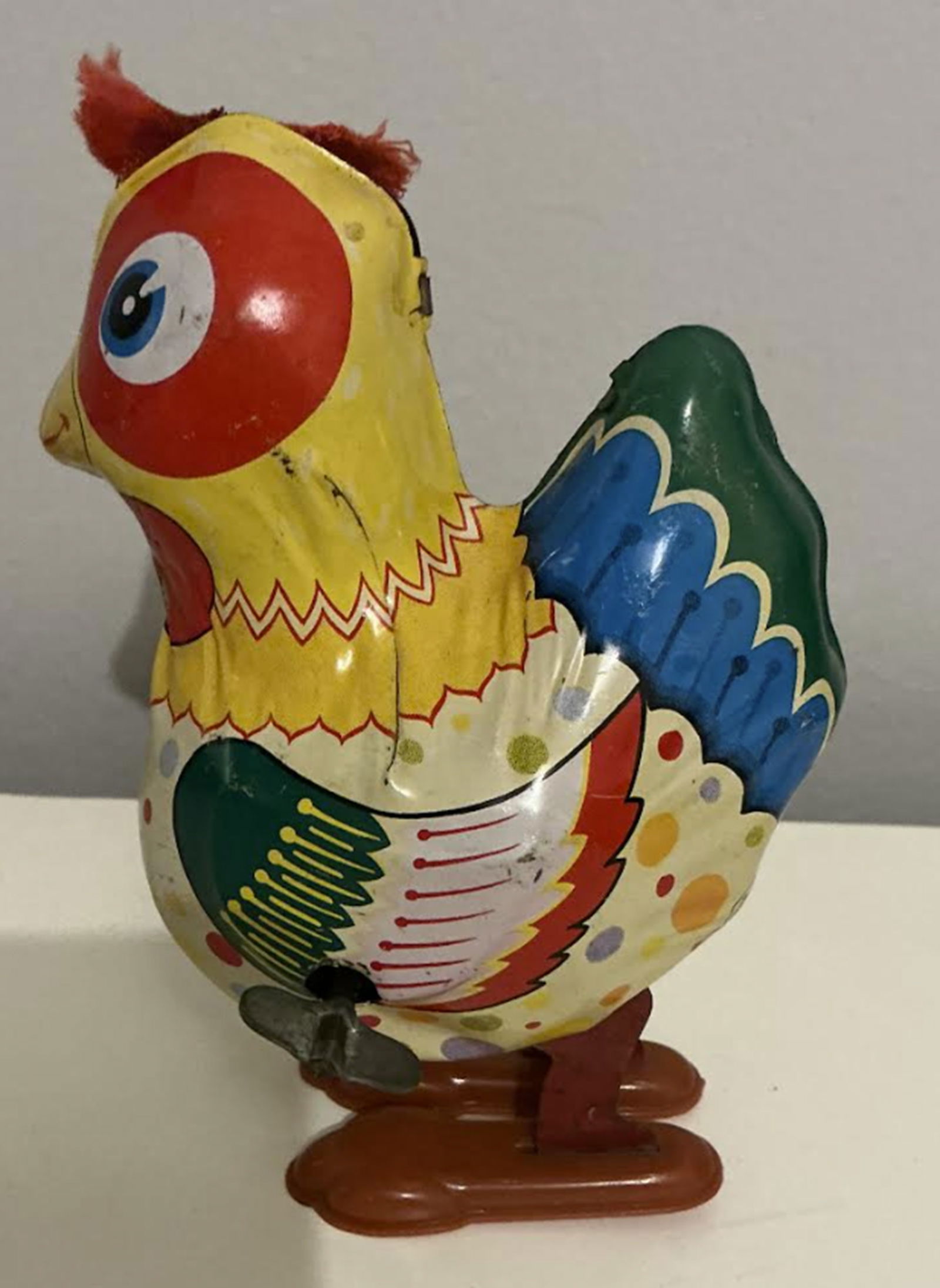 Japanese Yone Tin Litho Windup With Key Works: Japanese Yone Tin Litho Windup With Key Works. measures approx 5.25 inches tall and 4 inches wide.