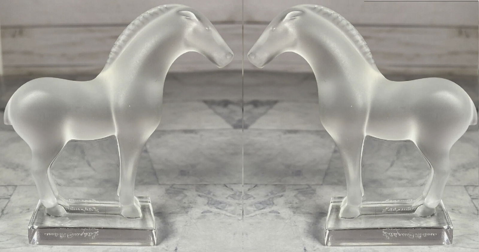 Lalique Signed Pair Tang Horse Figurines MAde in France: Lalique Signed Pair Tang Horse Figurines Made in France. Each Measures approx no chips or cracks present. Measures approx 3 1/2” X 4”