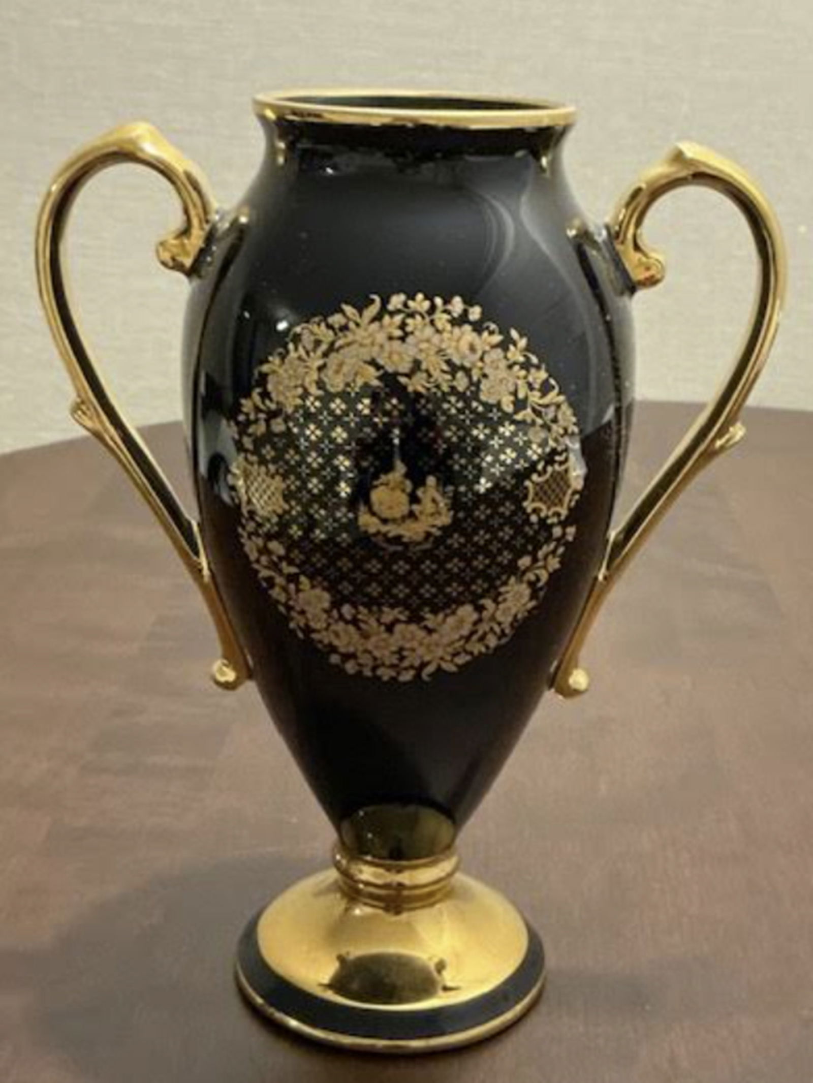 Limoges Castel France Signed Tall Porcelain Vase Urn With 22 Karat Gold accents: Limoges Castel France Signed Tall Porcelain Vase Urn With 22 Karat Gold accents. Measures approx 9 3/4 inches tall and 8 inches wide. This is a vintage Limoges Castel porcelain vase, handcrafted in Fr