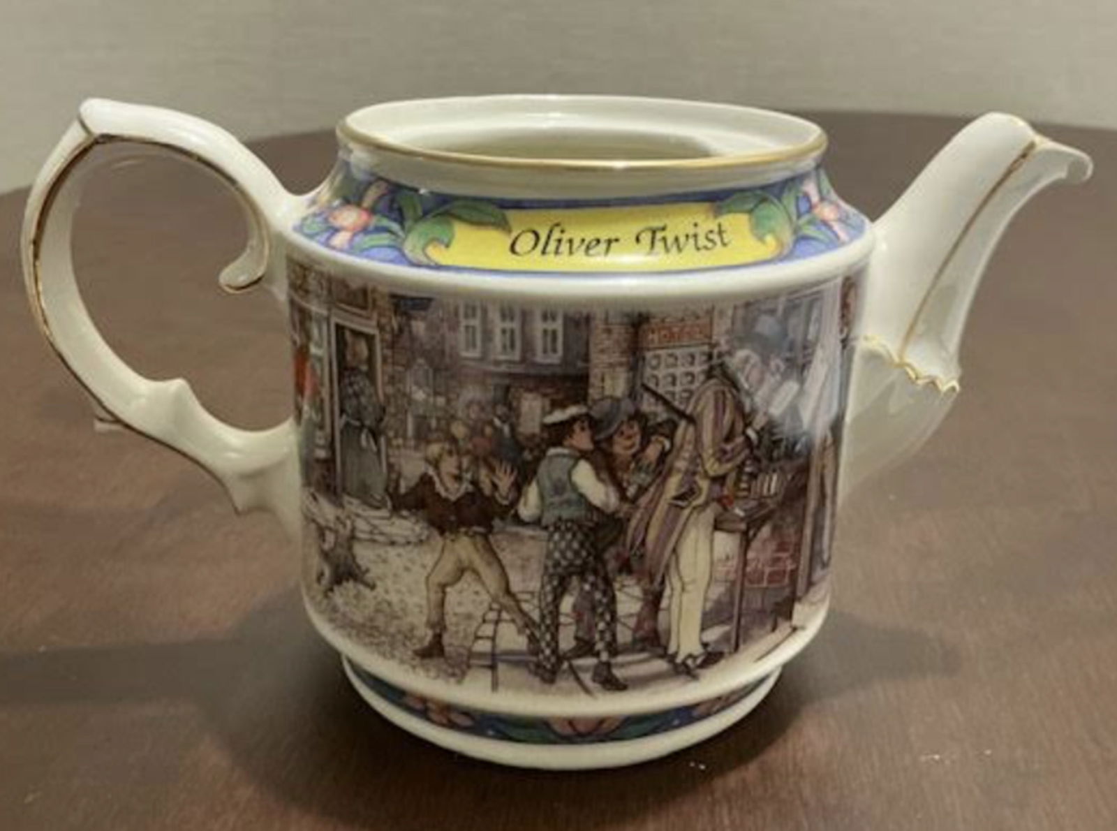 James Sadler Oliver Porcealing Twist Mug: James Sadler Oliver Twist mugMeasures approx 7 3/4 inches wide by 4.25 inches tall Made in England
