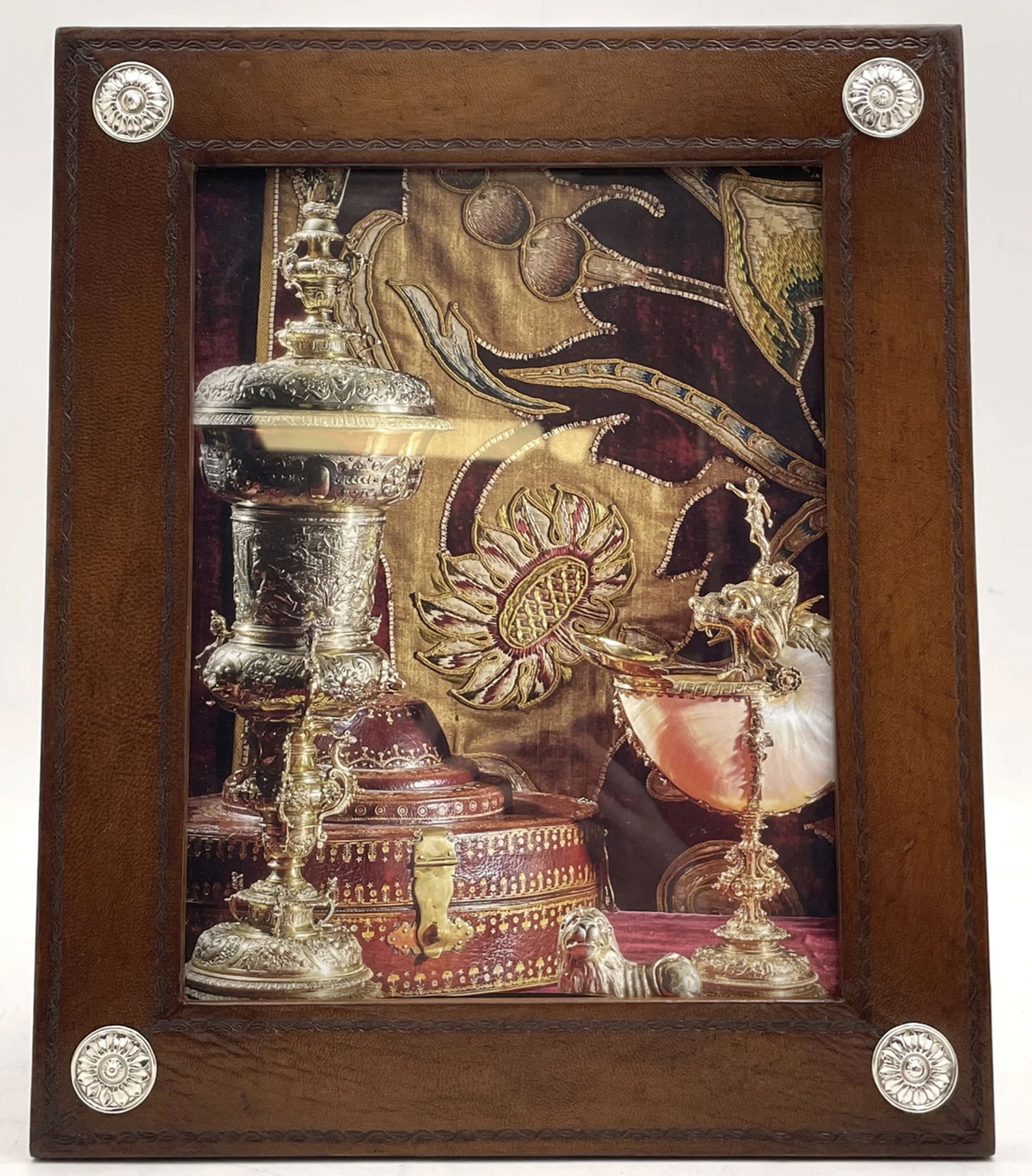 William Scott Leather & Sterling Silver Picture Frame: William Scott Leather & Sterling Silver Picture Frame. William Scott leather picture frame with applied sterling silver floral motifs. It measures 12'' by 10'' (inner dimensions are 9'' by 7'') and be