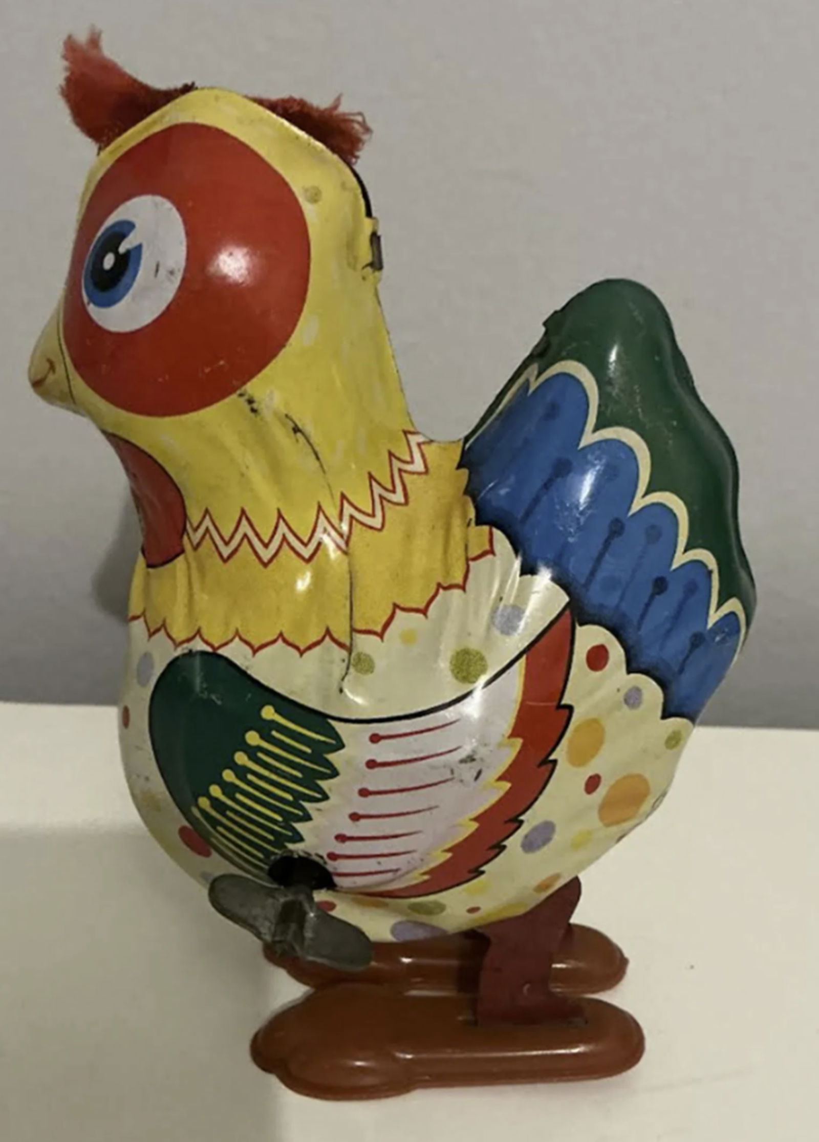 Japanese Yone Tin Litho Windup With Key Works: Japanese Yone Tin Litho Windup With Key Works. measures approx 5.25 inches tall and 4 inches wide.