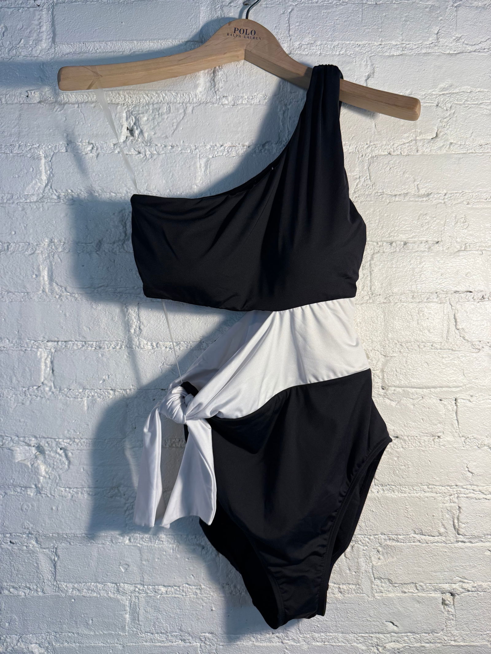 Lauren Ralph Lauren One Piece Swimsuit: Lauren Ralph Lauren One Piece Swimsuit Size 6. Color blocked lined one shoulder swimsuit with adjustable side hip bow and side cutout. New with tags- sanitary sticker in place, never worn. Lined